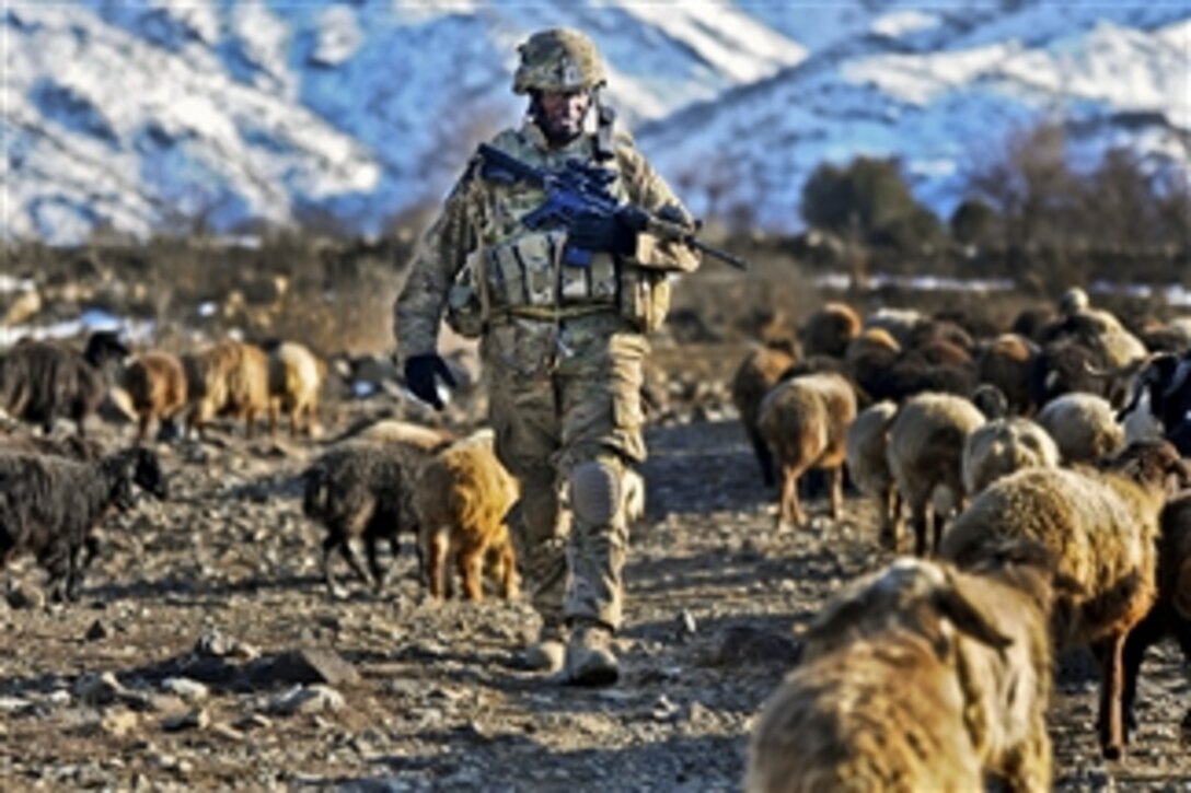 U.S. Army Staff Sgt. Jonathan Price conducts a security patrol near the village of Narizah in Afghanistan's Tani district on Feb. 10, 2012.  Price is a squad leader assigned to the 501st Infantry Division's Company B, 1st Battalion Airborne.  