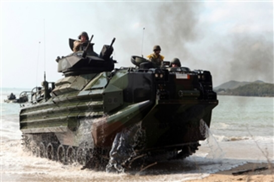 A U.S. Marine Corps amphibious assault vehicle assigned to Battalion Landing Team, 1st Battalion, 4th Marine Regiment, 31st Marine Expeditionary Unit comes ashore during a mechanized raid in support of Cobra Gold 2012 in Hat Klad, Thailand, on Feb. 11, 2012.  Cobra Gold is a regularly scheduled joint/combined exercise designed to ensure regional peace and strengthen the ability of the Royal Thai Armed Forces to defend Thailand or respond to regional contingencies.  