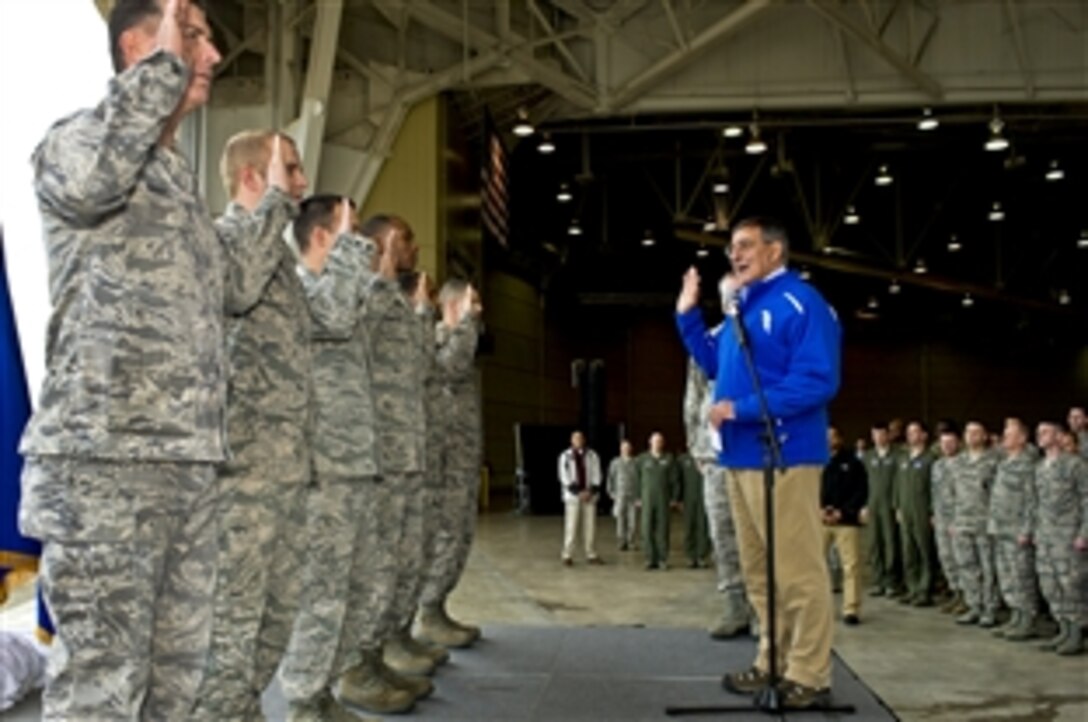 Defense Secretary Leon E. Panetta re-enlists airmen on Barksdale Air Force Base, La., Feb. 17, 2012. Panetta also thanked the airmen assigned to the Global Strike Command for their service.