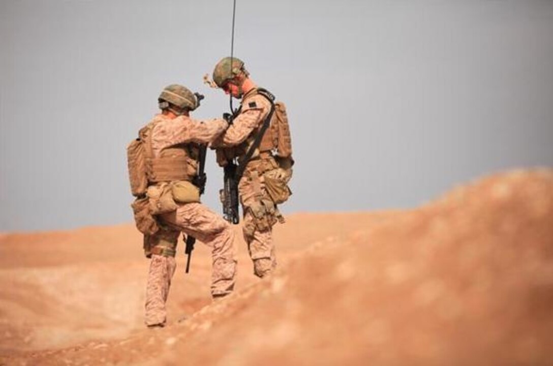 U.S. Marines with Charlie Company, 1st Battalion, 8th Marine Regiment, Regimental Combat Team 6 conduct pre-combat checks before a security patrol in Kajaki, Helmand province, Afghanistan Feb. 19,  2012. To help Marines identify the stages of operational stress, the Operational Stress Control and Readiness, OSCAR, program is taught to all infantry battalions across the Marine Corps. Keeping with a long-standing tradition of small unit leadership, the OSCAR program teaches leaders at all levels how to get their Marines the help they may need.