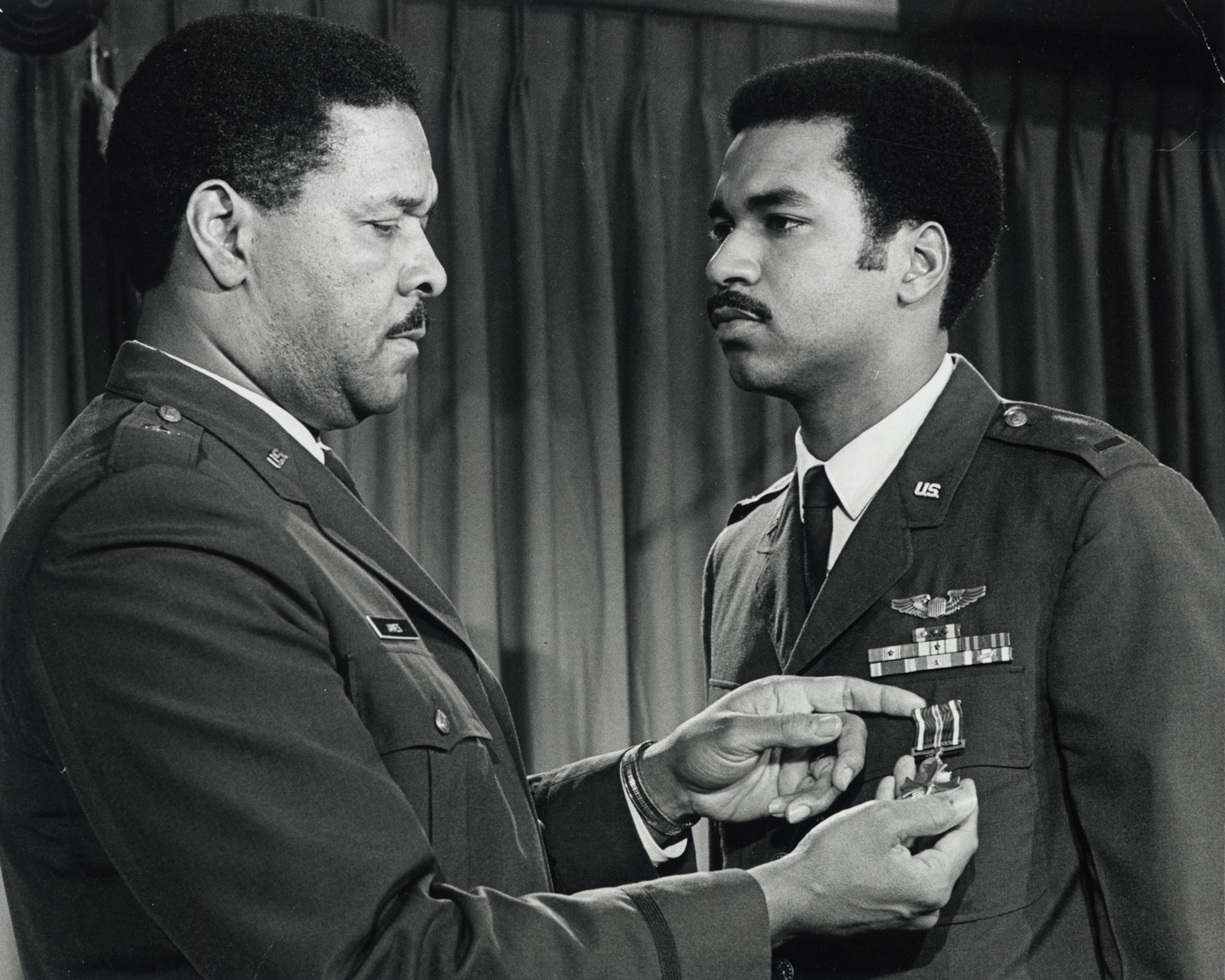 Daniel James III receiving an award from his Dad, Gen. Daniel "Chappie" James Jr.