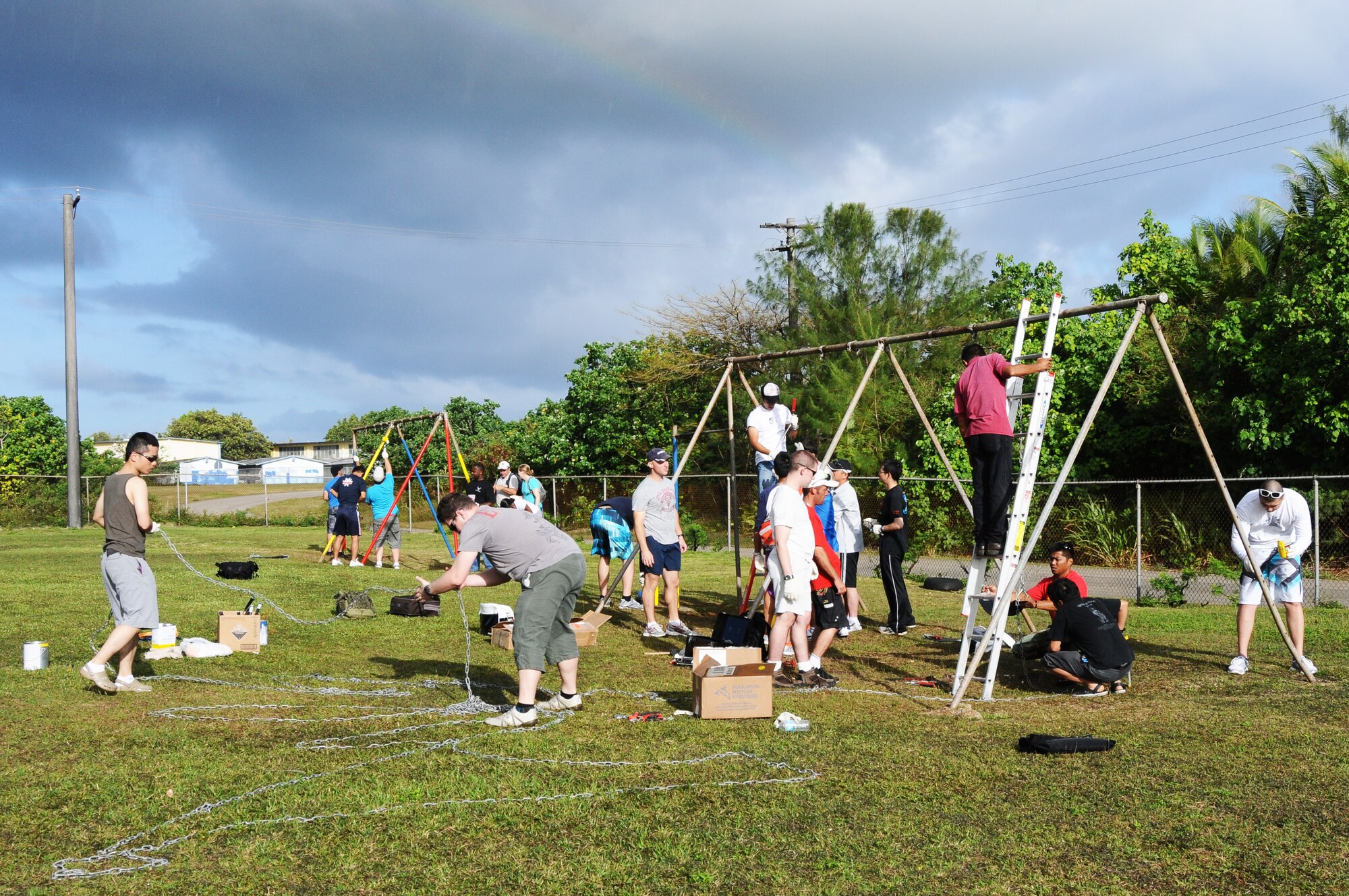 Members of Team Andersen along with members from the Japan Air Self Defense Force and the Royal Australian Air Force participate in a community beautification project in Dededo, Guam, Feb. 18. The community event was part of Cope North 2012 a multinational exercise designed to enhance air operations between the U.S. Air Force, JASDF and the RAAF. (U.S. Air Force photo/Senior Airman Carlin Leslie)