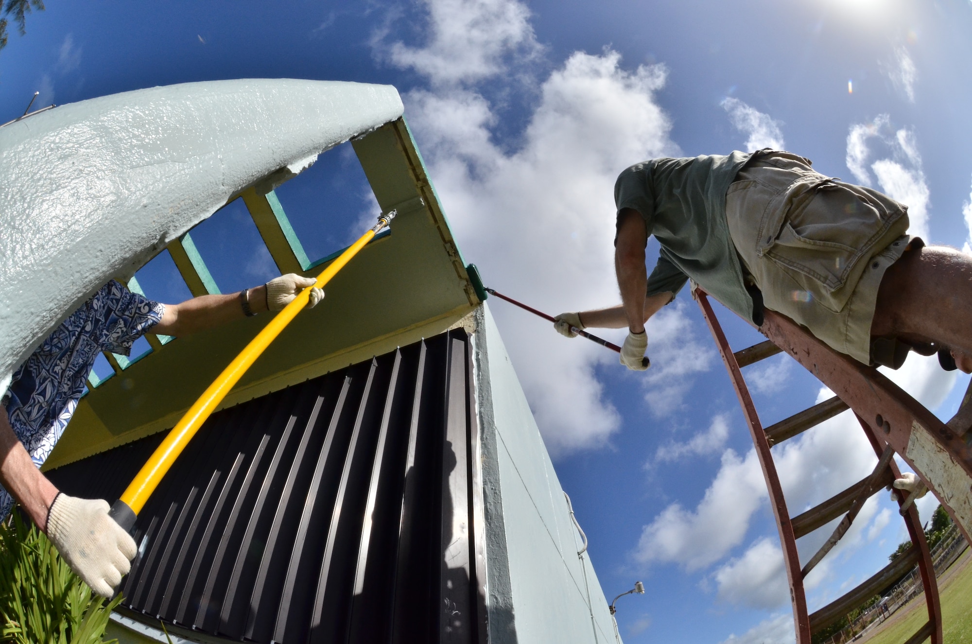 ANDERSEN AIR FORCE BASE, Guam - Members of Team Andersen along with members from the Japan Air Self Defense Force and the Royal Australian Air Force
participate in a community beautification project in Dededo, Guam, Feb. 18.
(U.S. Air Force photo by Staff Sgt. Alexandre Montes) 
