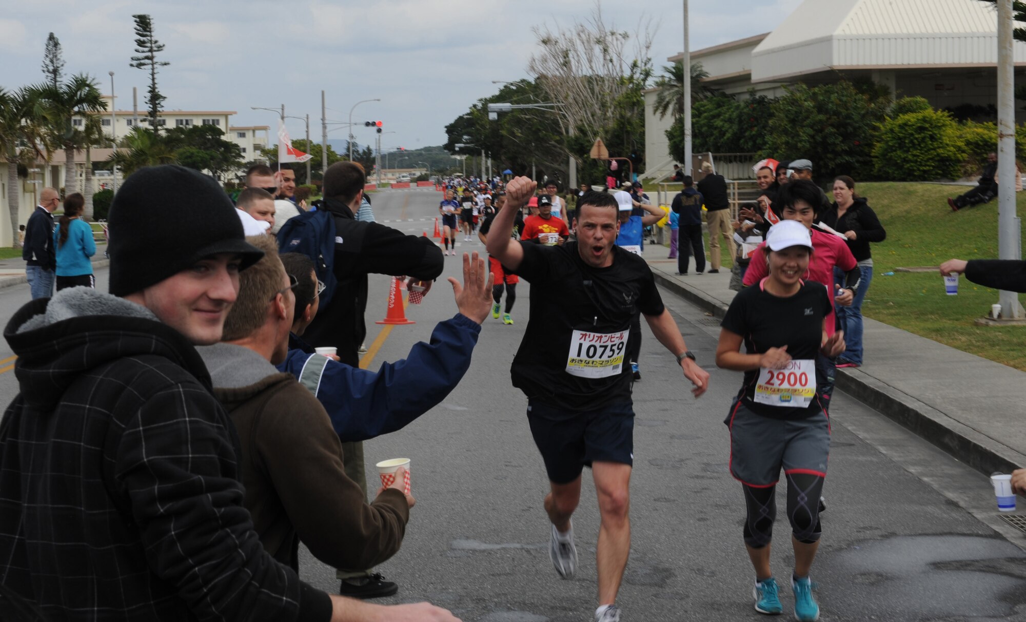 U.S. Air Force Brig. Gen. Matthew Molloy, 18th Wing commander, and other runners participate in the 2012 Okinawa Marathon on Kadena Air Base, Japan, Feb. 20, 2012. More than 11,000 runners participated in the 2012 Okinawa Marathon, including more than 250 military personnel from bases around the island. (U.S. Air Force photo by Airman 1st Class Justin Veazie/Released)