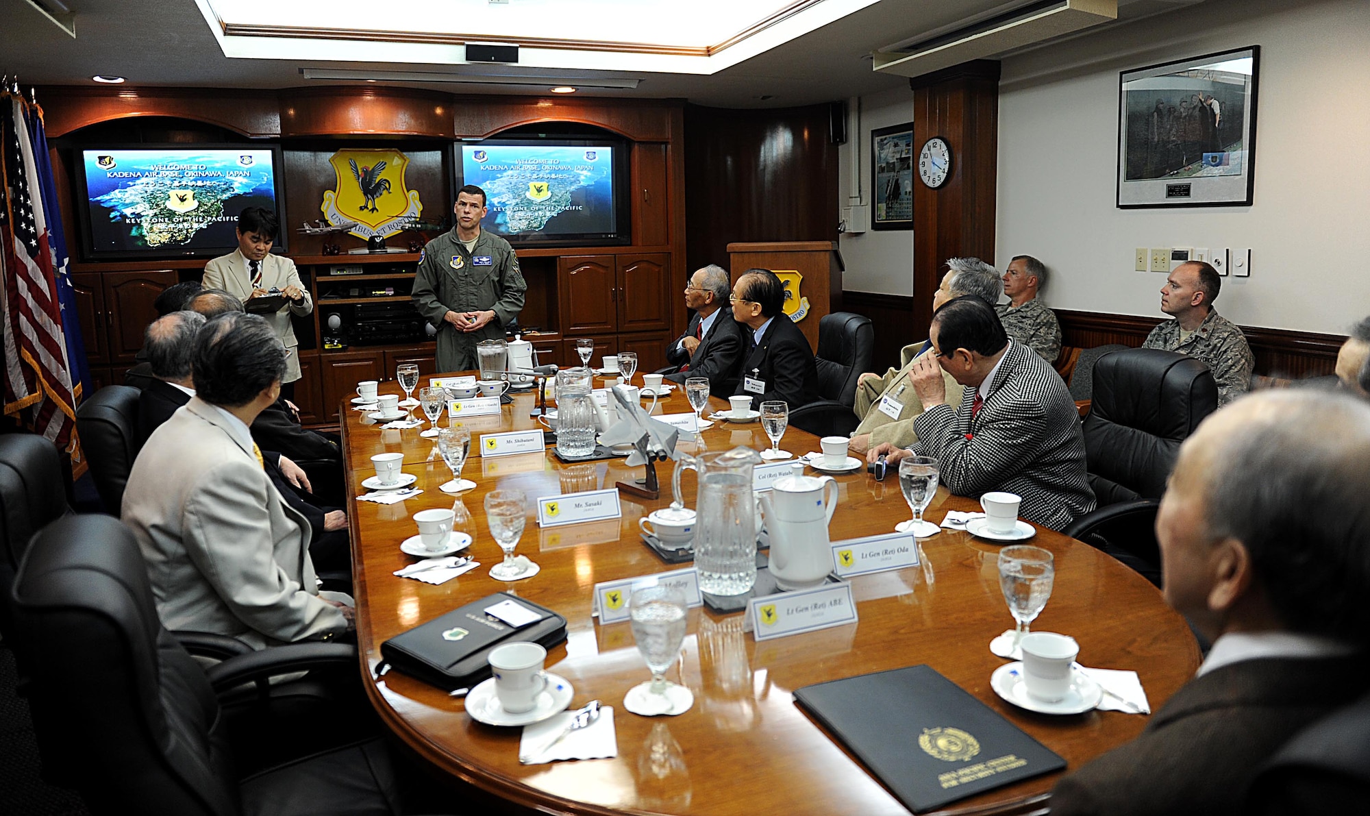 U.S. Air Force Brig. Gen.  Matthew Molloy, 18th Wing commander, briefs members of the Japan-American Air Force Goodwill Association during a visit on Kadena Air Base, Japan, Feb. 16, 2012. JAAGA promotes bilateral friendship and mutual understanding between the Japan Air Self-Defense Forces and the U.S. Air Force. (U.S. Air Force photo by Airman 1st Class Brooke P. Beers/Released) 