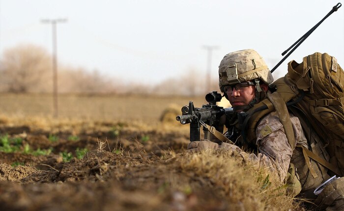 2nd Lt. Theodore Hardy, the platoon commander for 2nd platoon, India Company, 3rd Battalion, 7th Marine Regiment, leads his platoon during a partnered patrol with the Afghan National Army, Feb. 20. Hardy and the rest of India Company have been mentoring and training the ANA to take over once Coalition Forces withdraw from the area. The Afghan soldiers at Patrol Base Hangar patrolled, with the Marines in support, through an area known for insurgent activity.