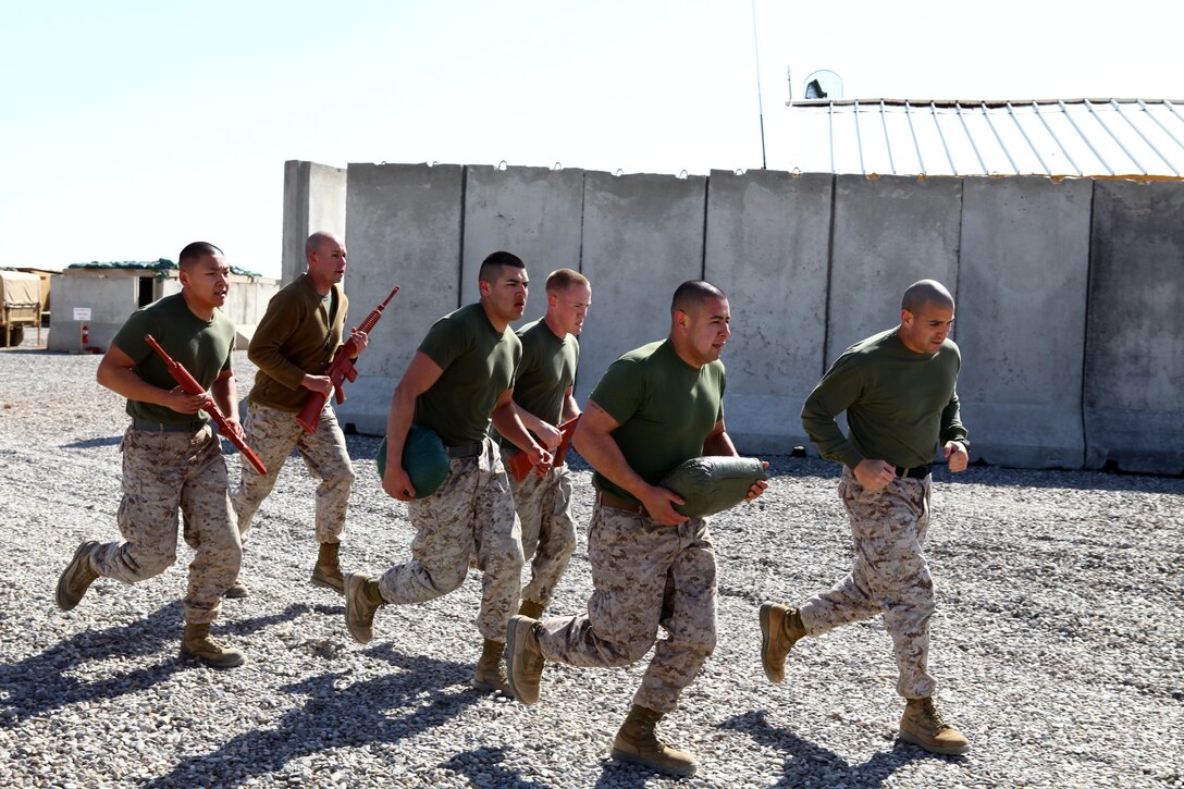 Personnel and administration Marines with Regimental Combat Team 6 conduct a “moto” run. They carry two 30-pound sandbags and mock weapons while running, and the sand bags are passed from one Marine to another during the run. Even when deployed physical training is a huge part of being a Marine, they pride themselves on endurance, strength and toughness. Whether carrying 70 pounds of gear on the march or completing a 10-mile conditioning run, Marines give everything they have into staying in shape.