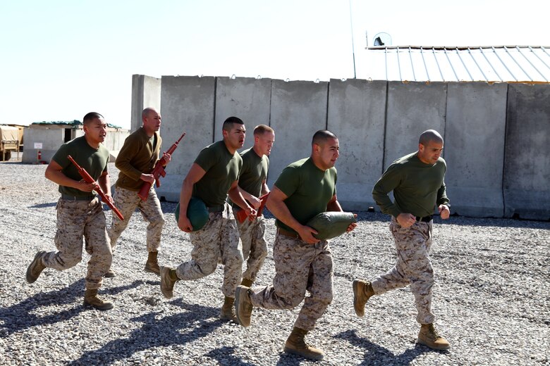 Personnel and administration Marines with Regimental Combat Team 6 conduct a “moto” run. They carry two 30-pound sandbags and mock weapons while running, and the sand bags are passed from one Marine to another during the run. Even when deployed physical training is a huge part of being a Marine, they pride themselves on endurance, strength and toughness. Whether carrying 70 pounds of gear on the march or completing a 10-mile conditioning run, Marines give everything they have into staying in shape.