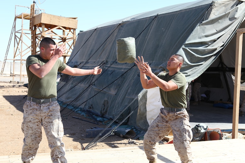 Personnel and administration Marines with Regimental Combat Team 6 toss 30-pound sandbags to one another as quickly as they can. Even when deployed physical training is a huge part of being a Marine, they pride themselves on endurance, strength and toughness. Whether carrying 70 pounds of gear on the march or completing a 10-mile conditioning run, Marines give everything they have into staying in shape.