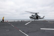 A UH-1Y Huey from Marine Light Attack Helicopter Squadron 167 lands aboard the landing dock platform USS San Antonio for refueling during Exercise Bold Alligator 2012 on Feb. 2. This exercise, the largest naval amphibious exercise in the past 10 years, represents the Navy and Marine Corps' revitalization of the full range of amphibious operations. Bold Alligator is scheduled to run through Feb. 12 afloat and ashore in and around Virginia and North Carolina.