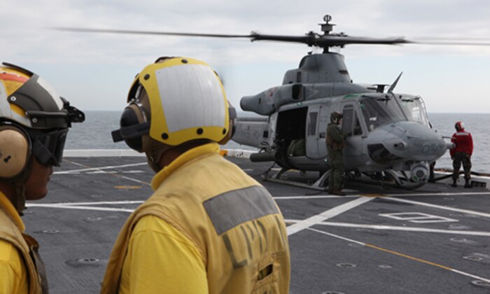 A UH-1Y Huey from Marine Light Attack Helicopter Squadron 167 lands aboard the landing dock platform USS San Antonio for refueling during Exercise Bold Alligator 2012, Feb. 2. This exercise, the largest naval amphibious exercise in the past 10 years, represents the Navy and Marine Corps' revitalization of the full range of amphibious operations. Bold Alligator is scheduled to run through Feb. 12 afloat and ashore in and around Virginia and North Carolina.