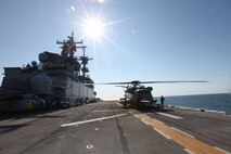The sun shines down on Marines and Sailors tying down a CH-53E Super Stallion from Marine Heavy Helicopter Squadron 461 aboard the USS Wasp during Exercise Bold Alligator Exercise 2012, Feb. 1. The exercise, the largest naval amphibious exercise in the past 10 years, represents the Navy and Marine Corps’ revitalization of the full range of amphibious operations. The exercise focuses on today’s fight with today’s forces, while showcasing the advantages of seabasing. This exercise will take place Jan. 30 - Feb. 12, 2012 afloat and ashore in and around Virginia and North Carolina.