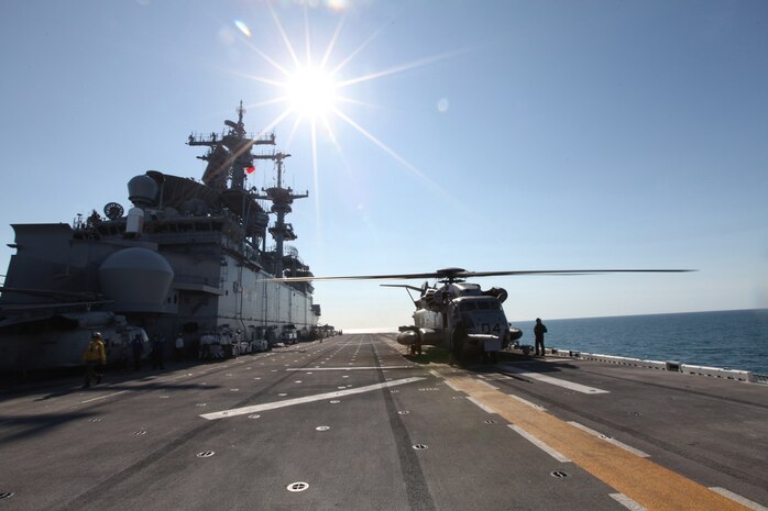 The sun shines down on Marines and Sailors tying down a CH-53E Super Stallion from Marine Heavy Helicopter Squadron 461 aboard the USS Wasp during Exercise Bold Alligator Exercise 2012, Feb. 1. The exercise, the largest naval amphibious exercise in the past 10 years, represents the Navy and Marine Corps’ revitalization of the full range of amphibious operations. The exercise focuses on today’s fight with today’s forces, while showcasing the advantages of seabasing. This exercise will take place Jan. 30 - Feb. 12, 2012 afloat and ashore in and around Virginia and North Carolina.