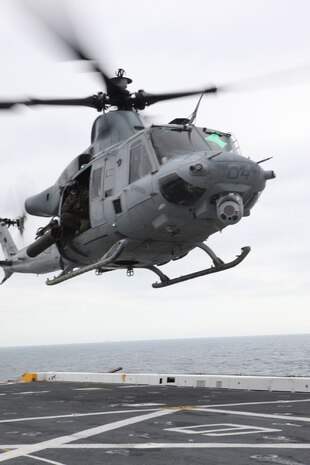A UH-1Y Huey from Marine Light Attack Helicopter Squadron 167 is landing aboard the landing dock platform USS San Antonio for refueling during Exercise Bold Alligator 2012 on Feb. 2. This exercise, the largest naval amphibious exercise in the past 10 years, represents the Navy and Marine Corps' revitalization of the full range of amphibious operations. Bold Alligator is scheduled to run through Feb. 12 afloat and ashore in and around Virginia and North Carolina.