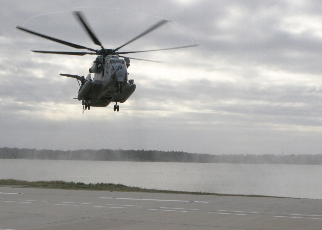 Marines with Marine Heavy Helicopter Squadron 461 conduct field carrier landing practice across from stony bay, near Marine Corps Air Station New River, Nov. 28. This training is intended to prepair them for Operation Bold Alligator, where they will be working from an aircraft carrier.

