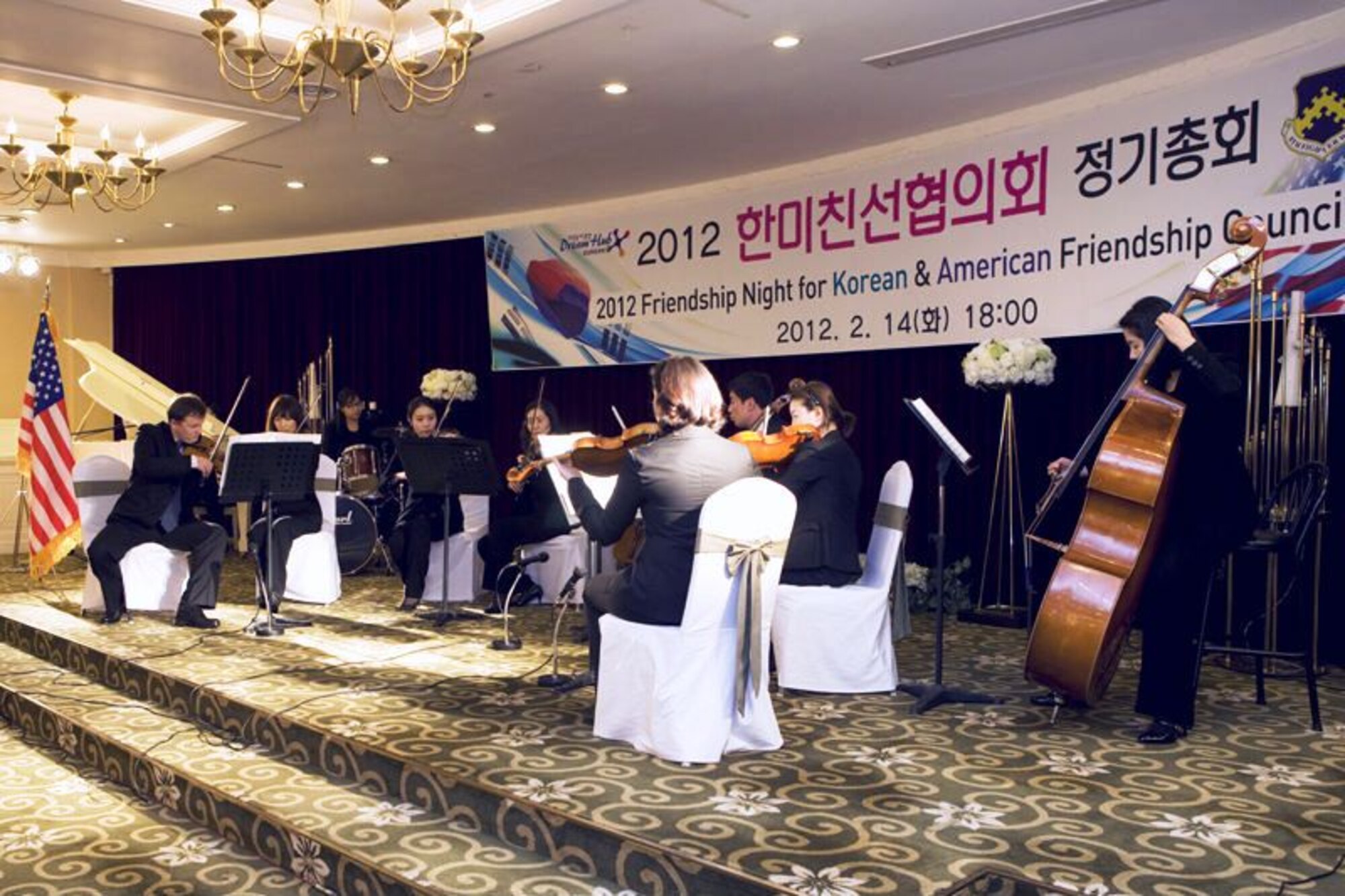 Gunsan Philharmonic Orchestra plays music during the Korean and American Friendship Council Annual Friendship Night, Feb. 14, 2012. The event hosted servicemembers from Kunsan Air Base, top Korean government officials from Gunsan City and local civic leaders who expressed mutual appreciation and support for each others’ service.  (Courtesy photo/Gunsan City Hall)