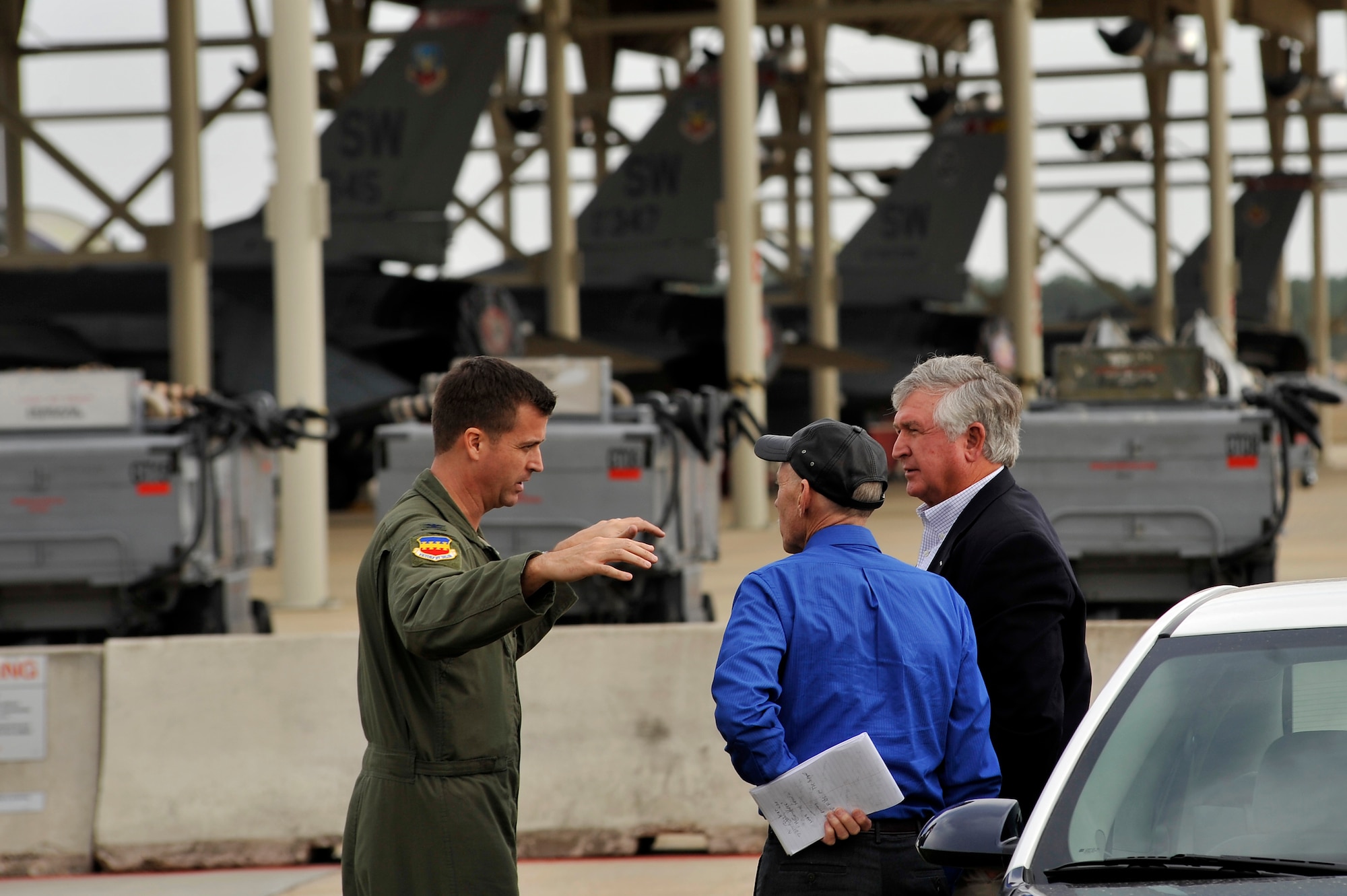 U.S. Air Force Col. Charlie Moore, 20th Fighter Wing commander, (left) discusses Shaw's mission capabilities with his father U.S. Army Col. (ret.) Charles Moore, Sr. and a reporter, Feb. 7, 2012. Moore, Sr. recently visited Shaw to congratulate his son for his recent selection for promotion to the rank of brigadier general. During his visit, he was afforded the opportunity to witness Shaw's mission first hand. (U.S. Air Force photo by Senior Airman Kenny Holston/Released)  


