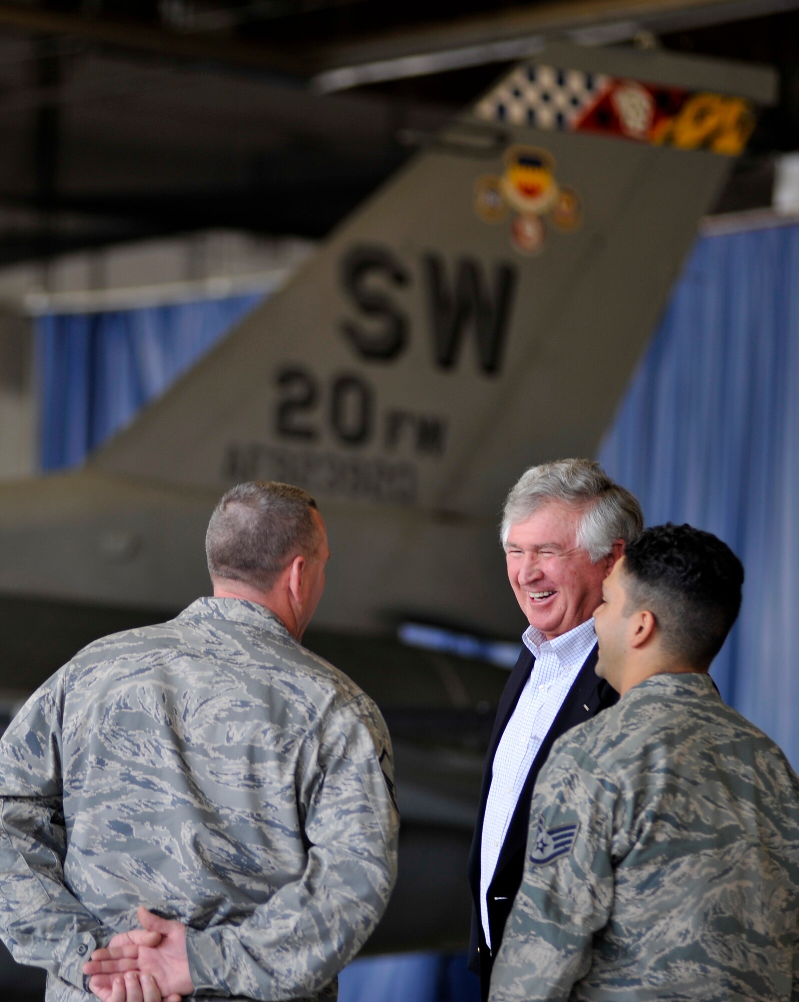 U.S. Army Col. (ret.) Charles Moore, Sr. (center) talks with Airmen from the 20th Aircraft Maintenance Squadron during a base tour, Feb. 7, 2012. Moore, Sr. recently visited Shaw to congratulate his son Col. Charlie Moore, 20th Fighter Wing commander, for his recent selection for promotion to the rank of brigadier general. During his visit, he was afforded the opportunity to witness Shaw's mission first hand. (U.S. Air Force photo by Senior Airman Kenny Holston/Released)


