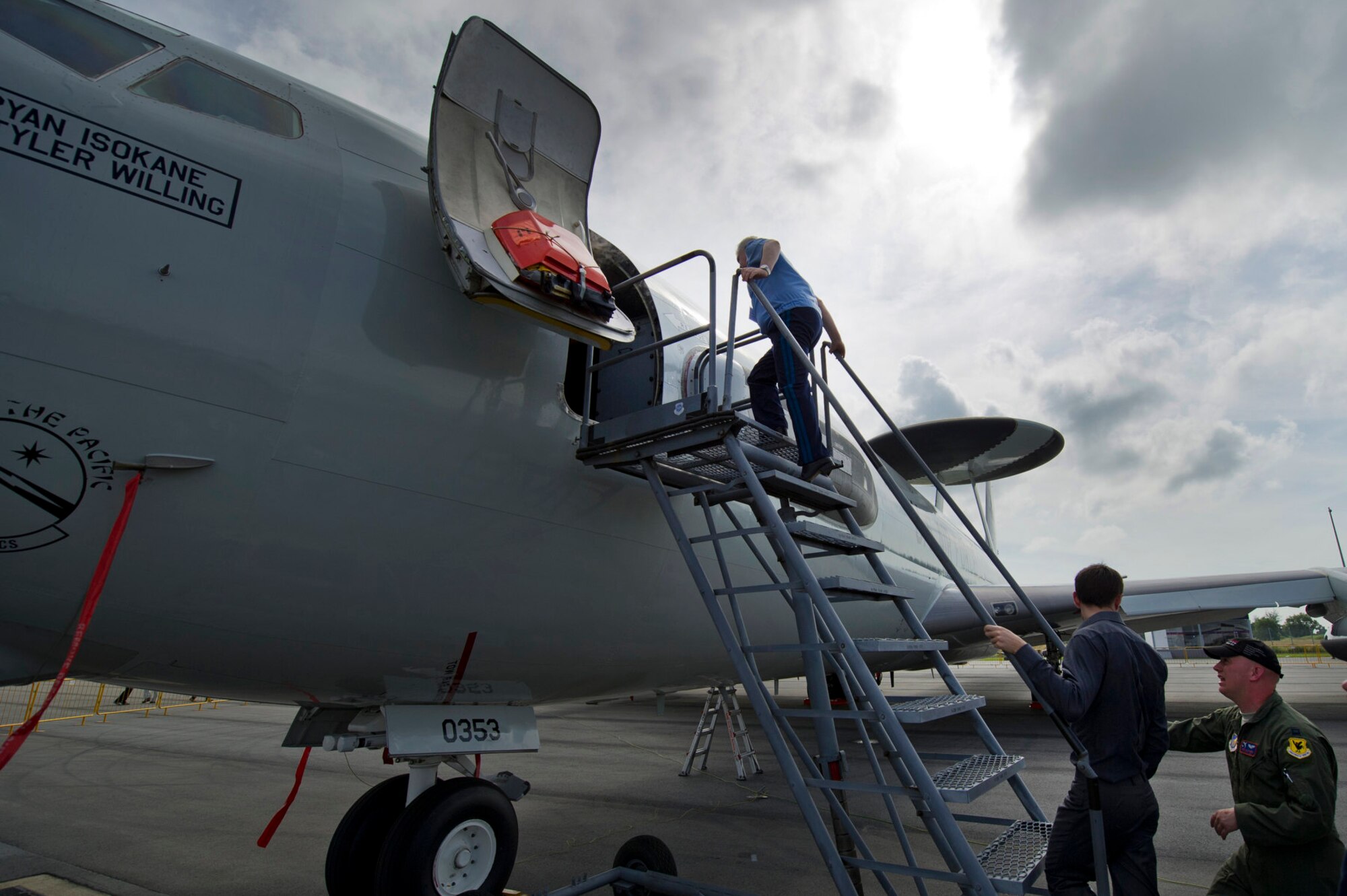 CHANGI, Singapore -- The Commander in Chief of the Russian Air Force Col. Gen. Alexander Zelin climbs aboard a U.S. Air Force E-3 Sentry on Feb. 15, 2012, at the 2012 Singapore Airshow. The biennial Singapore Airshow, while being the third largest trade show in the world also provides the opportunity for Airmen from many different countries to interact and improve foreign relations. (Department of Defense photo by U.S. Air Force Tech. Sgt. Michael R. Holzworth/Released)