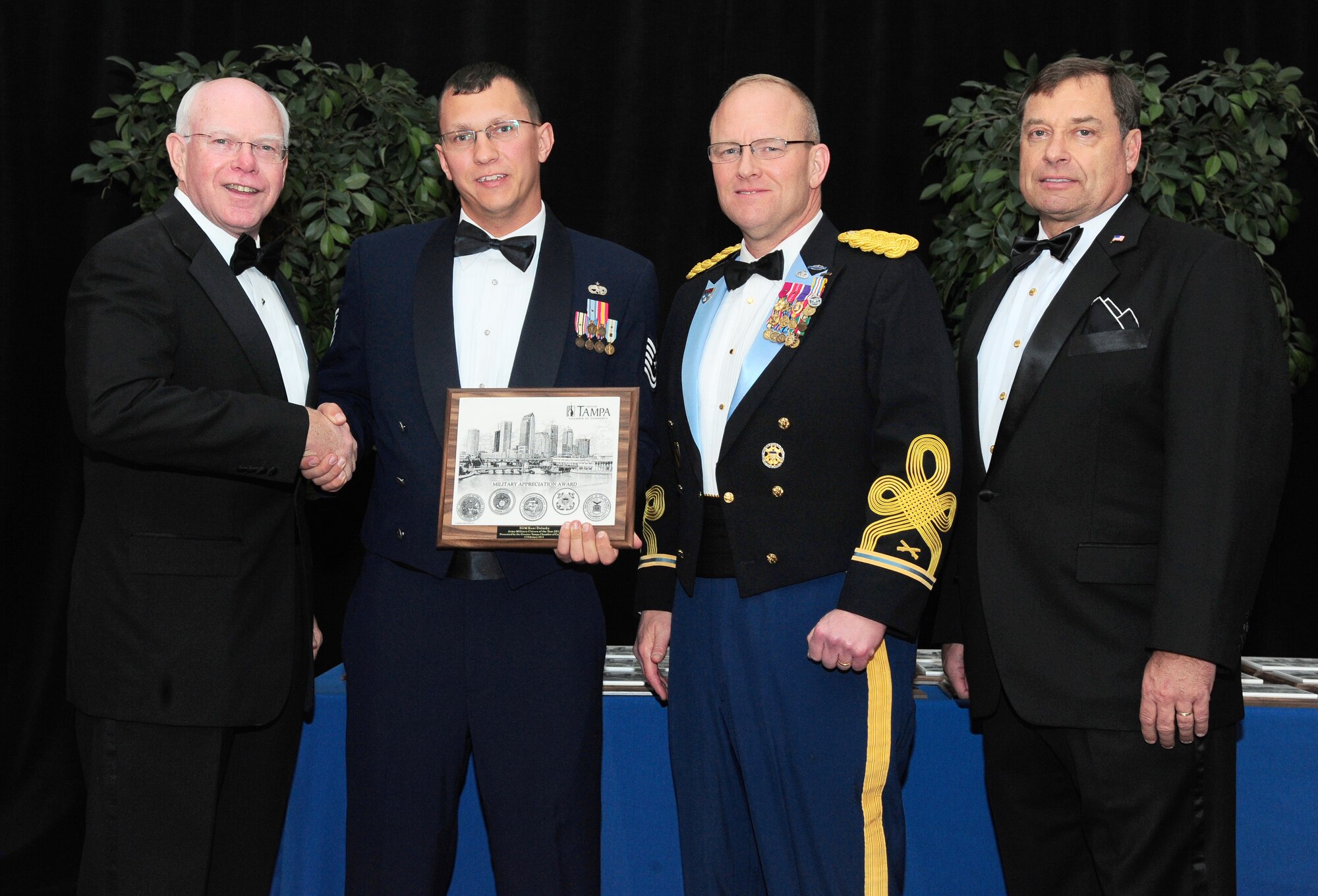 Tampa, Fla. -- Technical Sgt. Scott Sendtko, aerospace ground equipment technician with the 827th Maintenance Squadron, was recognized as the 927th Air Refueling Wing Enlisted Member of the Year.  The award was presented by Col. David Southerland, special assistant to the chairman of the Joint Chiefs of Staff, during a ceremony in downtown Tampa.  (Official U.S. Air Force photo by Airman David Tracy)