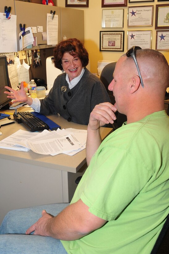 Judy Acord, Army Career and Alumni Program contractor installation manager, counsels U.S. Army Sgt. 1st Class Christopher Wagner, 97th Transportation Company 1st mate, on resume writing at the ACAP center at Fort Eustis, Va., Feb. 21, 2012. The ACAP center provides Soldiers with a 30 minute one-on-one counseling session before being entered into the four-day Transition Assistance Program. (U.S. Air Force photo by Staff Sgt. Ashley Hawkins/Released)