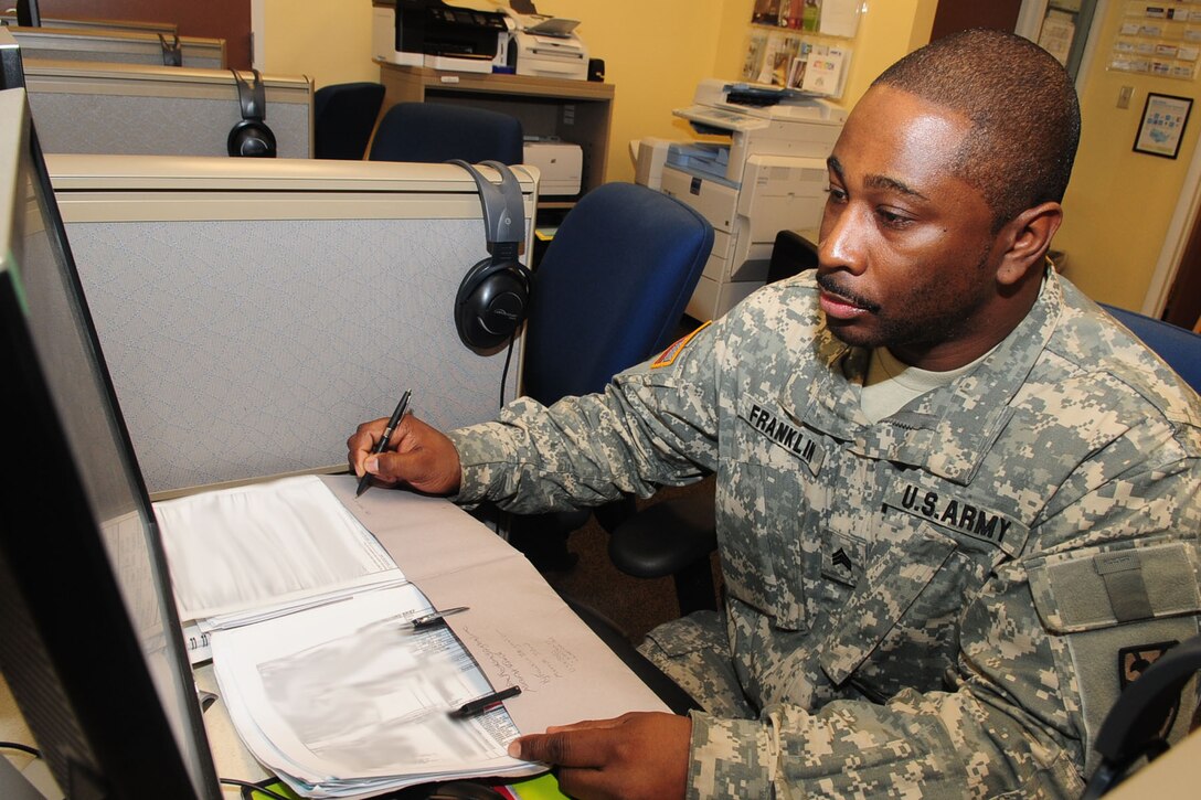 U.S. Army Sgt. Kareem Franklin, 149th Transportation Company human resources NCO, searches for civilian jobs at the Army Career and Alumni Program center, at Fort Eustis, Va., Feb. 21, 2012. Personnel entering into the program are required to create a resume, individual transition plan and a financial budget before completion. (U.S. Air Force photo by Staff Sgt. Ashley Hawkins)