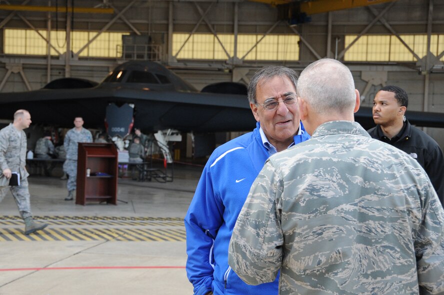 Secretary of Defense Leon E. Panetta speaks with Barksdale leadership during his visit to Barksdale Air Force Base, La., Feb. 17. The Secretary hosted an All-Call with more than 300 Airmen to thank them for their efforts in operating, maintaining and supporting the long range strike missions performed by the B-52H Stratofortress, B-2 Spirit and B-1B Lancer bomber aircraft.  During the event, Secretary Panetta also re-enlisted six Airmen and presented medals to Airmen who served in Afghanistan and other overseas locations.  Following the All-Call, Secretary Panetta met with Headquarters Air Force Global Strike Command and 2nd Bomb Wing leadership for briefings on global strike capabilities. (U.S. Air Force photo/Airman 1st Class Micaiah Anthony)(RELEASED)