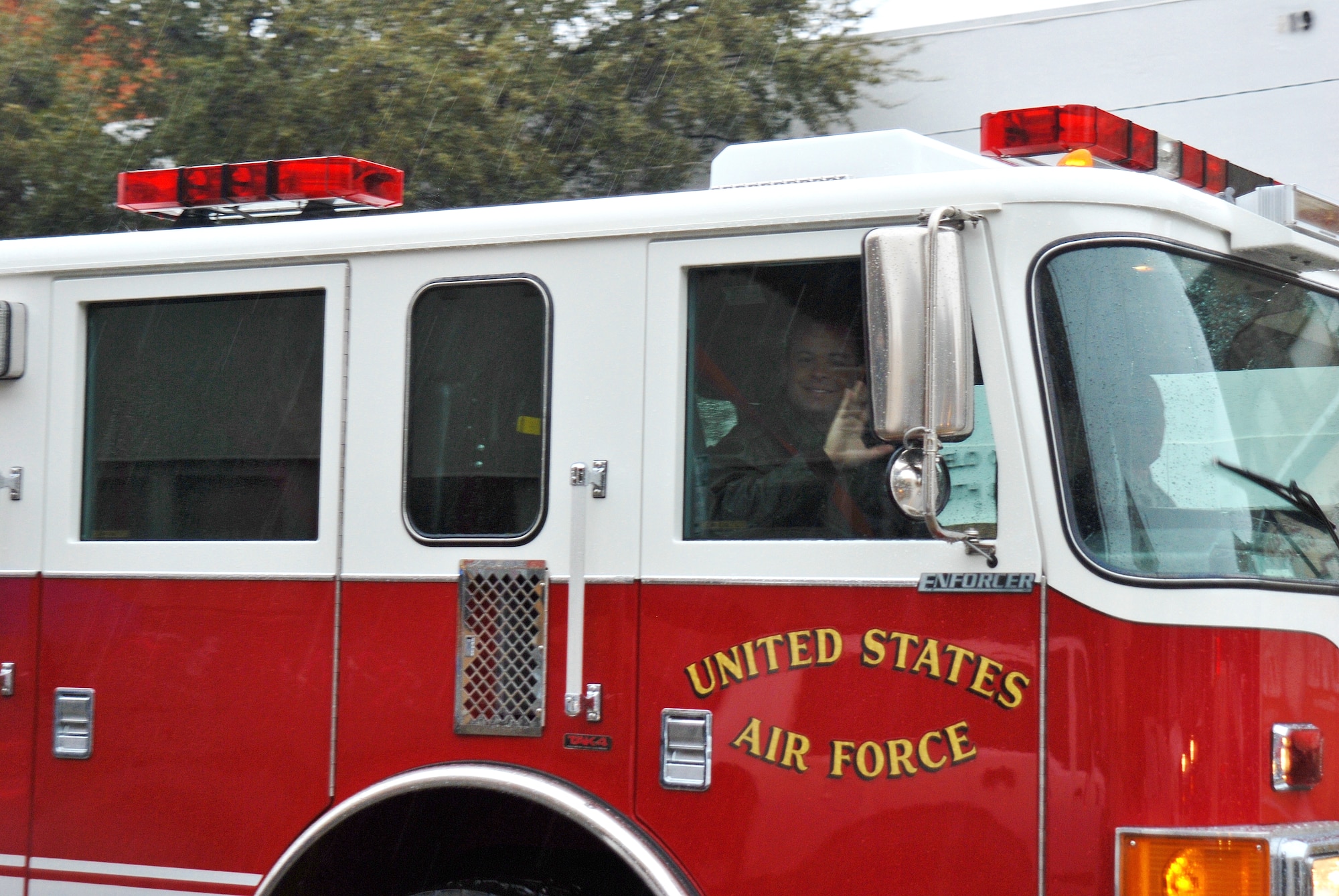 SAN ANGELO, Texas-- Col. Mark T. Damiano, 17th Training Wing Commander, along with his family, ride in a firetruck during the Annual San Angelo Rodeo Parade Feb. 14, downtown. Participants of the parade included local business, school, and city leaders.(U.S. Air Force photo/Airman 1st Class Michael Smith)
