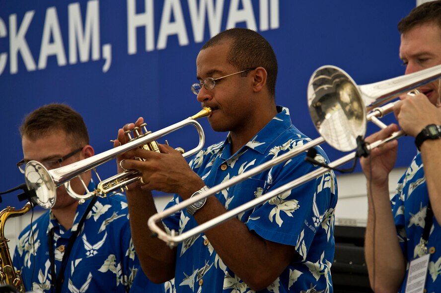 CHANGI, Singapore -- Master Sgt. Brian Hornbuckle U.S. Air Force Band of the Pacific, Hawaii plays the Trumpet during a performance on Feb. 17, 2012, at the 2012 Singapore Airshow. The band provided entertainment during the week long Singapore trade and air show performing 13 times. (Department of Defense photo by U.S. Air Force Tech. Sgt. Michael R. Holzworth/Released)