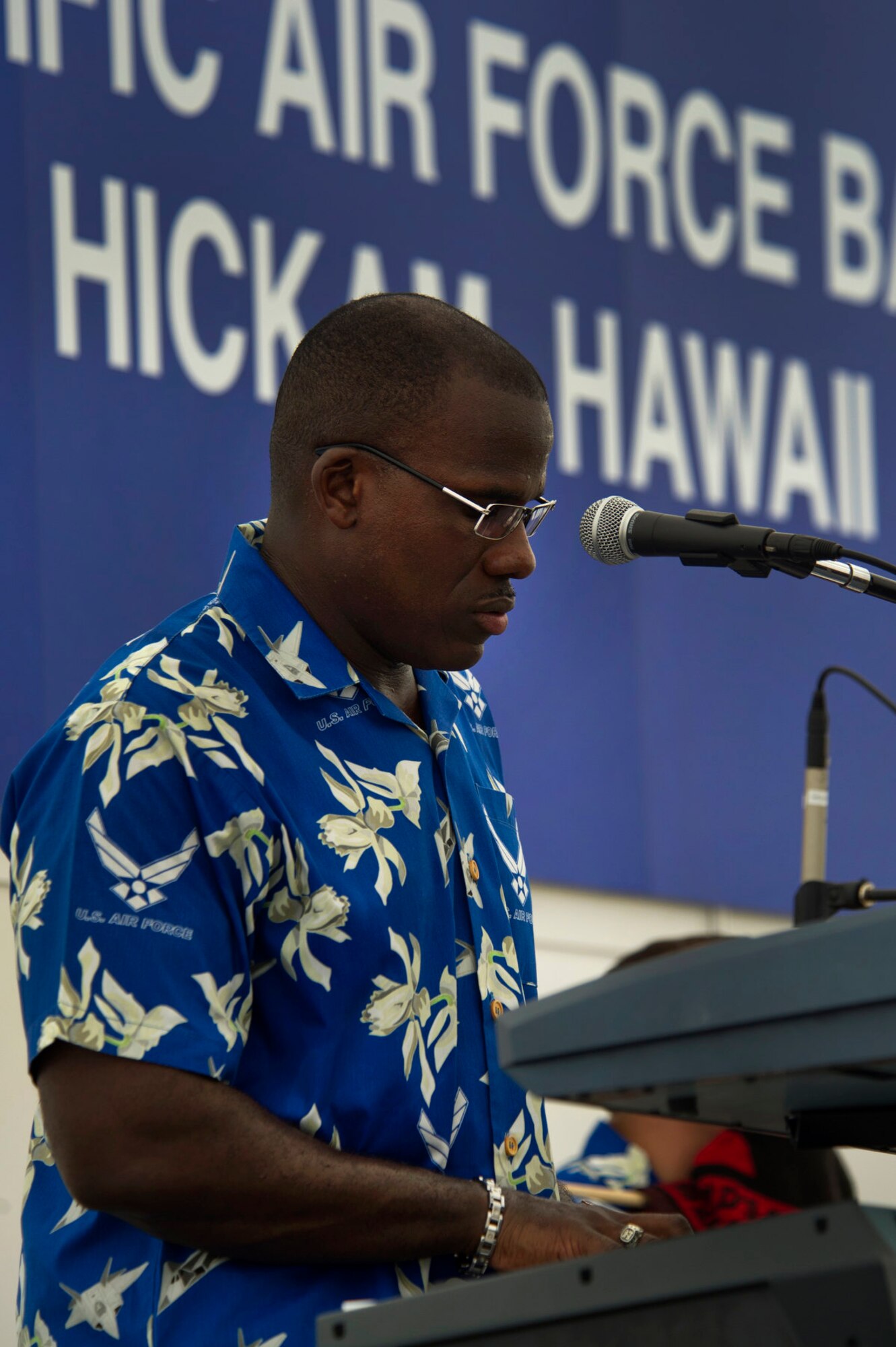 CHANGI, Singapore -- Master Sgt. Darryl McEachin, U.S. Air Force Band of the Pacific, Hawaii plays the keyboard during a performance on Feb. 17, 2012, at the 2012 Singapore Airshow. The band provided entertainment during the week long Singapore trade and air show performing 13 times. (Department of Defense photo by U.S. Air Force Tech. Sgt. Michael R. Holzworth/Released)
