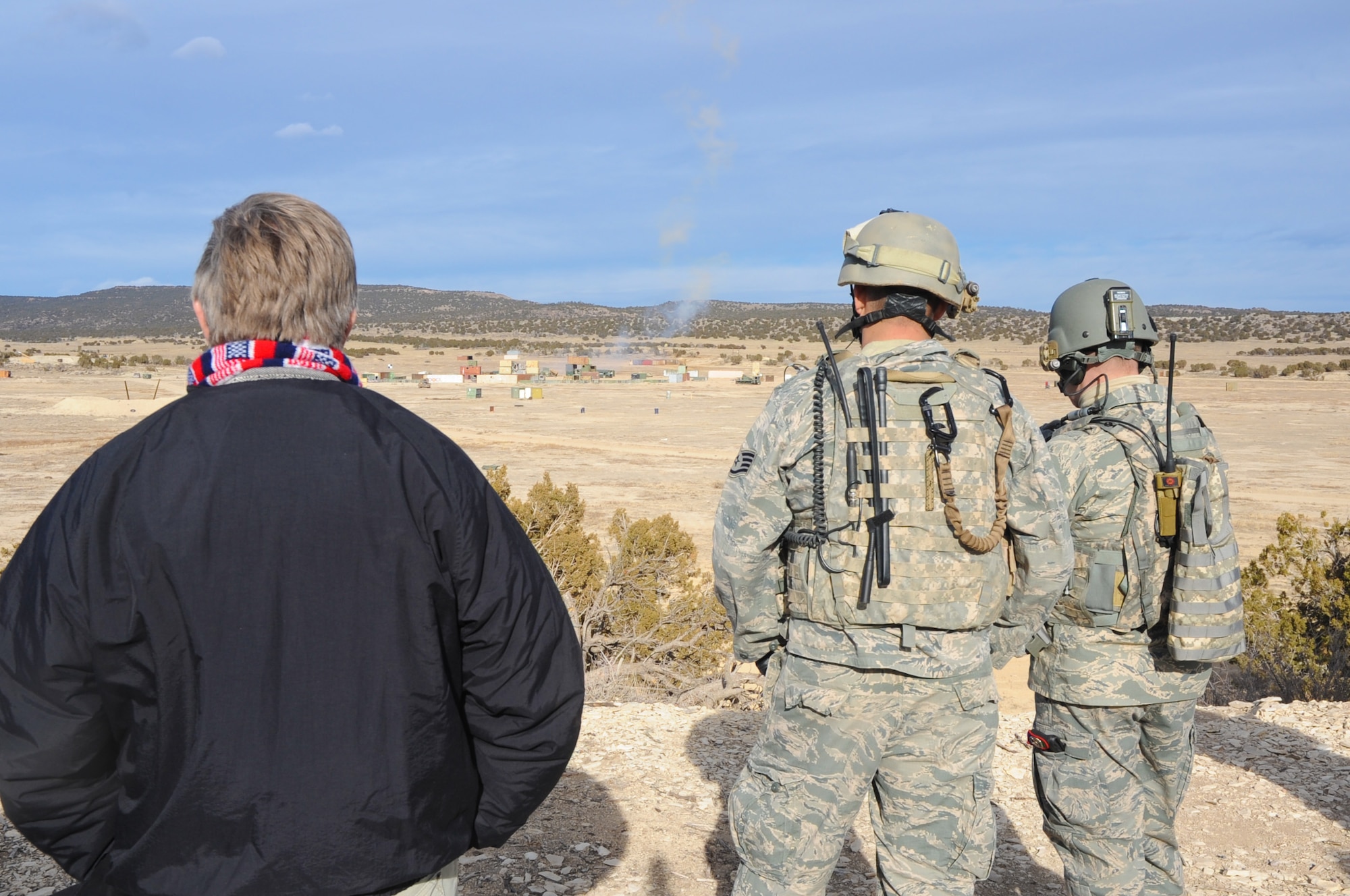 Members of the Colorado Thirty Group tours Colorado National Guard facilities across the state and learned about some of the Colorado National Guard’s key missions Jan. 18, 2012. The group travelled by Colorado Army National Guard UH-60 Black Hawk helicopters to visit Colorado Air National Guardsmen from the 137th Space Warning Squadron in Greeley, Colo., and the 140th Operations Support Squadron’s Airburst Range on Fort Carson, Colo., where the civilians learned of the key missions and skills the Colorado Guard provides the state and nation. At Fort Carson, civic leaders then observed a demonstration of this capability when active duty Air Force joint tactical air controllers on the ground provided targeting guidance and command authority for F-16 pilots in the skies above to drop simulated ordnance on specific training targets. (Official Air National Guard photo by Master Sgt. Cheresa D. Theiral)
