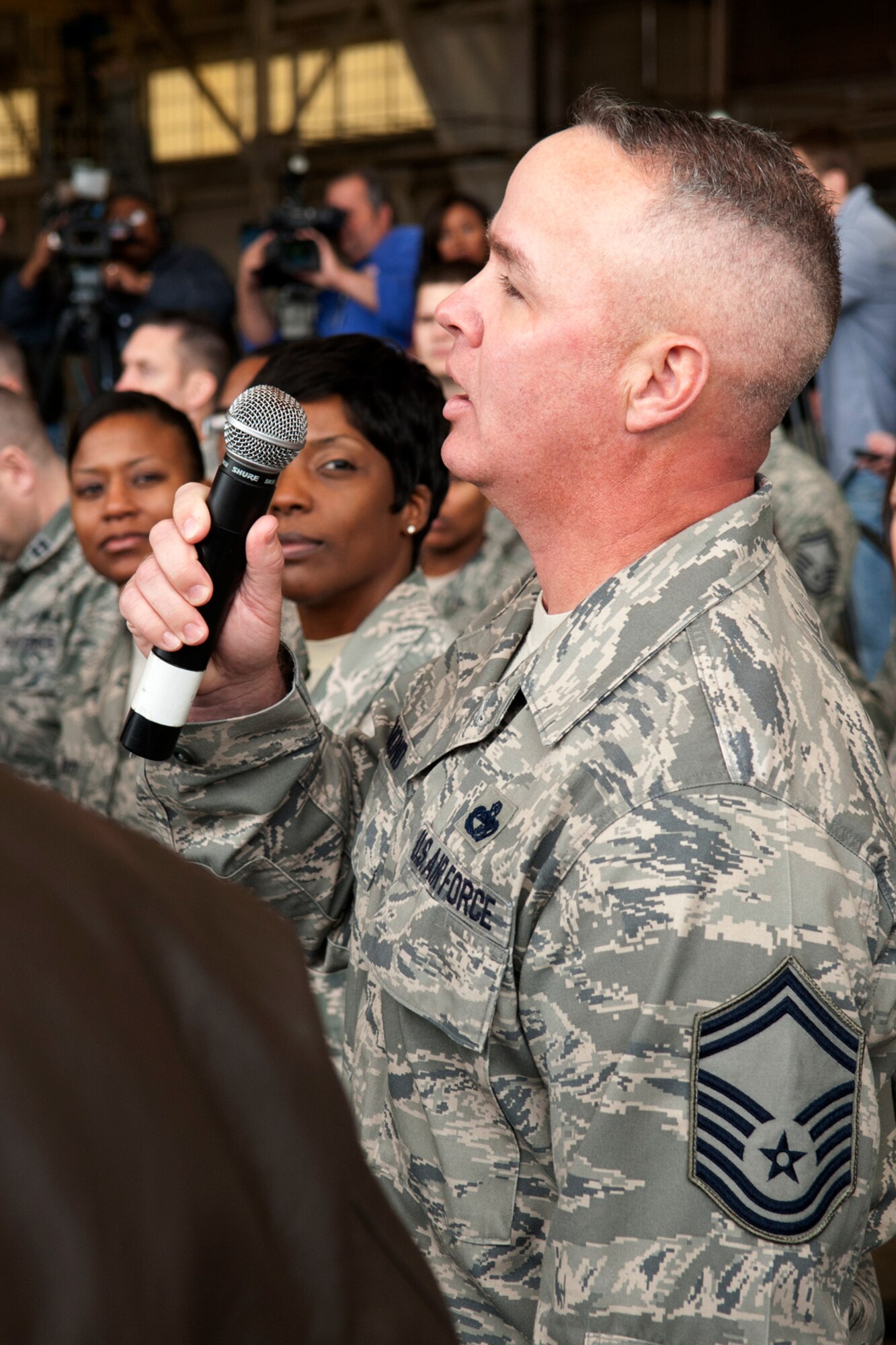 An Airmen asks Secretary of Defense Leon E. Panetta a question during an All-Call held at Barksdale Air Force Base, La., Feb. 17, 2012. The Secretary visited Barksdale and more than 300 Airmen attended the event. (U.S. Air Force photo by Master Sgt. Greg Steele/Released)