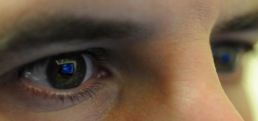 Air Force communication experts are working on switching from independent base networks to the new Air Force Network. AFNet will consolidate all accounts and networks through centralized servers providing users global access to their accounts, increasing security to the overall network and diminishing operating costs. (U.S. Air Force photo/Airman 1st Class Micaiah)(RELEASED)