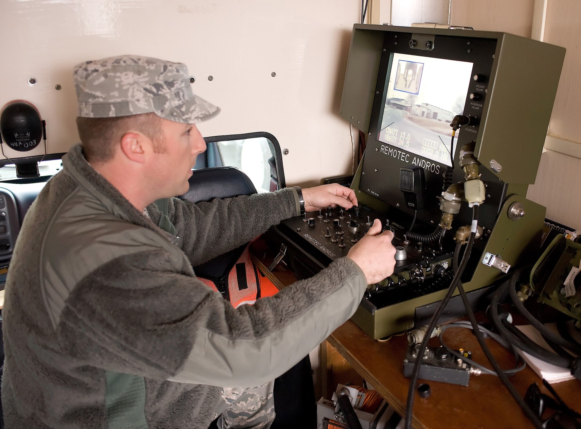 Airman 1st Class Gregg Lowry, an explosive ordinance disposal apprentice with the 436th Civil Engineer Squadron, operates the remote for the F-6 Talon EOD robot during the Major Accident Response Exercise Feb. 16, 2012, at Dover Air Force Base, Del. The MARE tested the emergency management personnel on proper procedures when handling a suspicious package containing unknown chemicals. (U.S. Air Force photo by Steve Kotecki)
