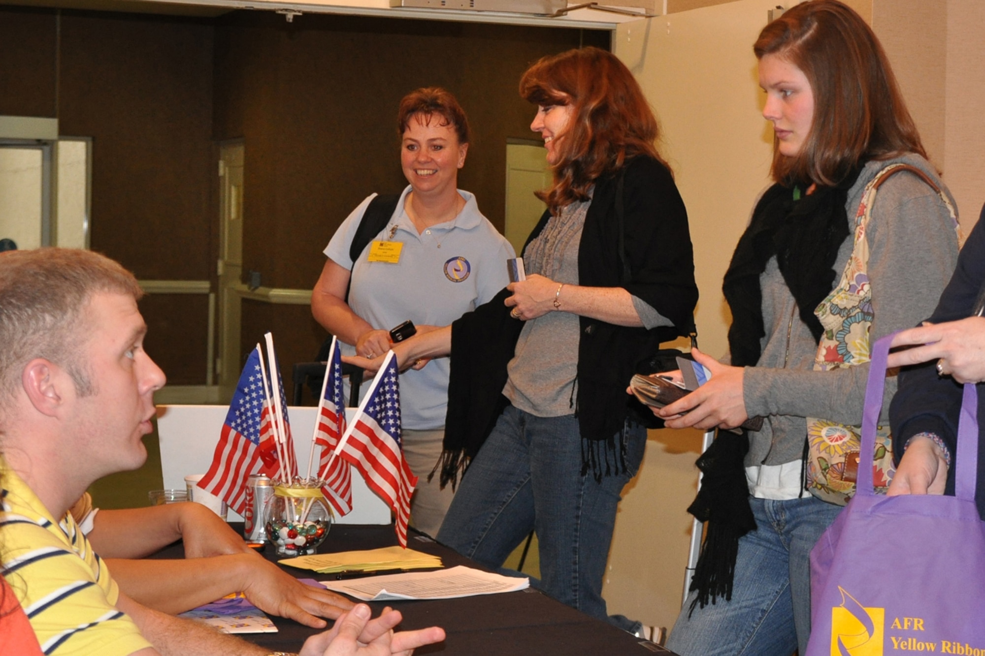 JACKSONVILLE, Fla—U.S. Air Force Reserve Master Sgt. Scott H. Smith, a
medical administrator with the 910th Medical Squadron, registers guests Feb.
17 for the Yellow Ribbon Reintegration Program (YRRP) held at the
Jacksonville Wyndham Hotel Feb. 17-19. Smith, along with 13 other Citizen
Airmen from the 910th Airlift Wing, volunteered to support the event.  The
YRRP is a DoD-wide effort to promote the well-being of National Guard and
Reserve members, their families and communities, by connecting them with
resources throughout the deployment cycle. Through these events, service
members and loved ones connect with local resources before, during, and
after deployments. For more information about the Yellow Ribbon
Reintegration Program visit www.yellowribbon.mil. U.S. Air Force Photo by
Maj. Brent J. Davis
