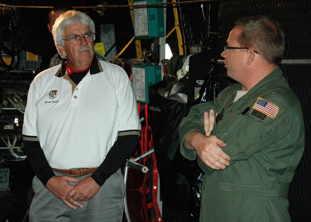 From inside an MC-130E aircraft on the Duke Field flightline Feb. 15, Master Sgt. Bobby Barton, a 711th Special Operations Squadron loadmaster, explains some of his aircrew responsibilities to Robert Strauss, an honorary commander for Eglin AFB’s 16th Electronic Warfare Squadron. The honorary commanders for dozens of Eglin and Duke Field organizations toured both bases to gain a better understanding of how their Airmen perform their respective missions for national defense.  (U.S. Air Force photo/Dan Neely)