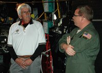 From inside an MC-130E aircraft on the Duke Field flightline Feb. 15, Master Sgt. Bobby Barton, a 711th Special Operations Squadron loadmaster, explains some of his aircrew responsibilities to Robert Strauss, an honorary commander for Eglin AFB’s 16th Electronic Warfare Squadron. The honorary commanders for dozens of Eglin and Duke Field organizations toured both bases to gain a better understanding of how their Airmen perform their respective missions for national defense.  (U.S. Air Force photo/Dan Neely)