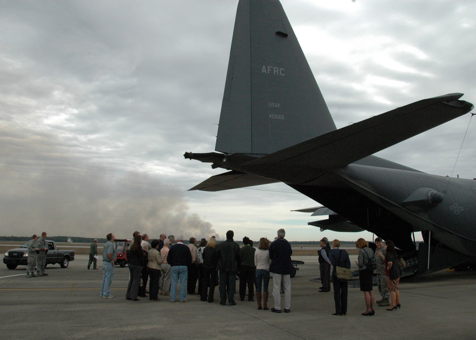 Honorary commanders from Eglin AFB and Duke Field gather on the Duke flightline Feb. 15 to tour a 919th Special Operations Wing MC-130E Combat Talon I aircraft.  The honorary commanders for dozens of Eglin and Duke Field organizations toured both bases to gain a better understanding of how their Airmen perform their respective missions for national defense.  (U.S. Air Force photo/Dan Neely)