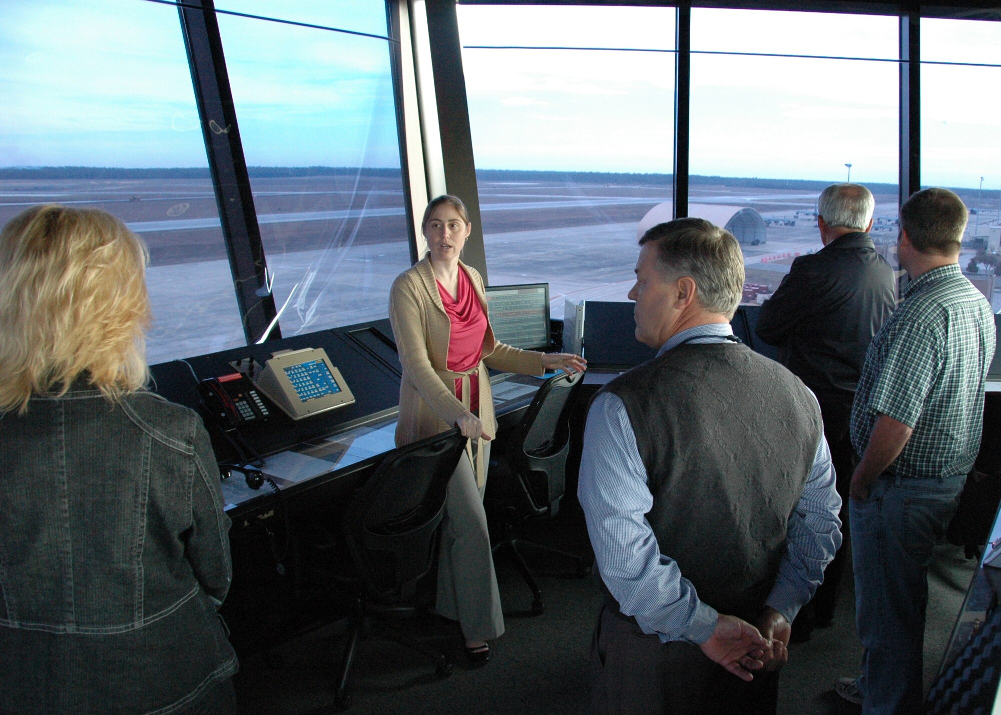 Teresa Gonzalez, a Duke Field tower controller, explains basic tower operations to visiting Eglin AFB and Duke honorary commanders Feb. 15.  The honorary commanders for dozens of Eglin and Duke Field organizations toured both bases to gain a better understanding of how their personnel perform their respective missions for national defense.  (U.S. Air Force photo/Dan Neely)