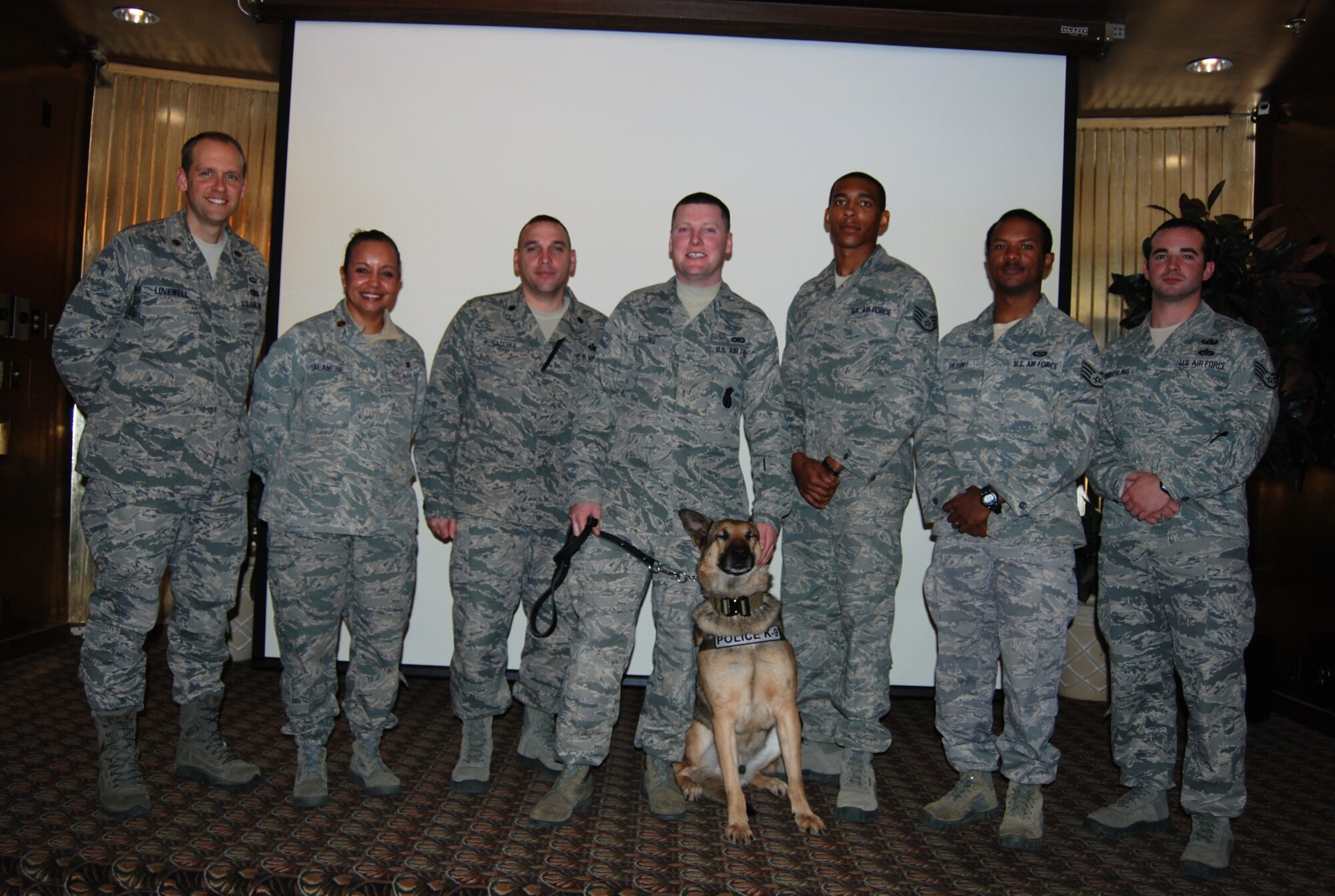 The 21st Logistics Readiness Squadron hosted the first Warrior Stories, a quarterly event to give Airmen the chance to share their deployment stories. The seven presenters were (left to right) Maj. Jim Lovewell, 21st LRS commander; Maj. Elis Salamone, 21st Medical Group women’s health nurse practitioner; Lt. Col. Joseph Musacchia, 21st Security Forces Squadron commander; Staff Sgt. Whit Young, military working dog handler; Max, 21st SFS military working dog; Staff Sgt. Jonathan Olds, 13th Air Support Operations Squadron joint terminal attack controller; Staff Sgt. Joseph Gilbert, 13th ASOS JTAC; and Staff Sgt. Mathew Kimberling, 21st Civil Engineer Squadron Explosive Ordnance Disposal technician. (U.S. Air Force photo/Lea Johnson)