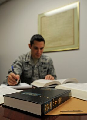 WHITEMAN AIR FORCE BASE, Mo. -- Senior Airman Brett Berry, 509th Bomb Wing staff judge advocate paralegal, researches information for an upcoming trial here Feb. 3.  Paralegals perform the underlying work ranging from conducting research to investigating accidents and ensuring a trial is done properly and developing a reprimand. (U.S. Air Force photo by Staff Sgt. Alexandra M. Boutte) (RELEASED)