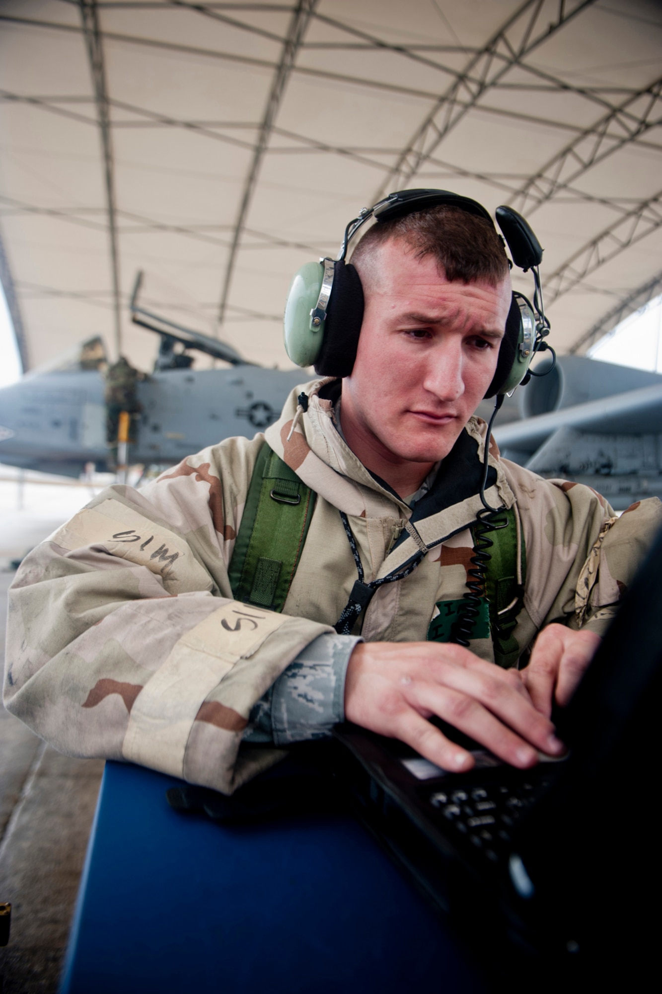 U.S. Air Force Staff Sgt. Kenneth Marthey, 23d Aircraft Maintenance Squadron crew chief, reviews aircraft data during an operational readiness exercise Feb. 16, 2012, at Moody Air Force Base, Ga. Crew chiefs review data and conduct pre-flight inspections of all aircraft before flight to ensure they are mission ready. (U.S. Air Force photo by Staff Sgt. Jamal D. Sutter/Released)  