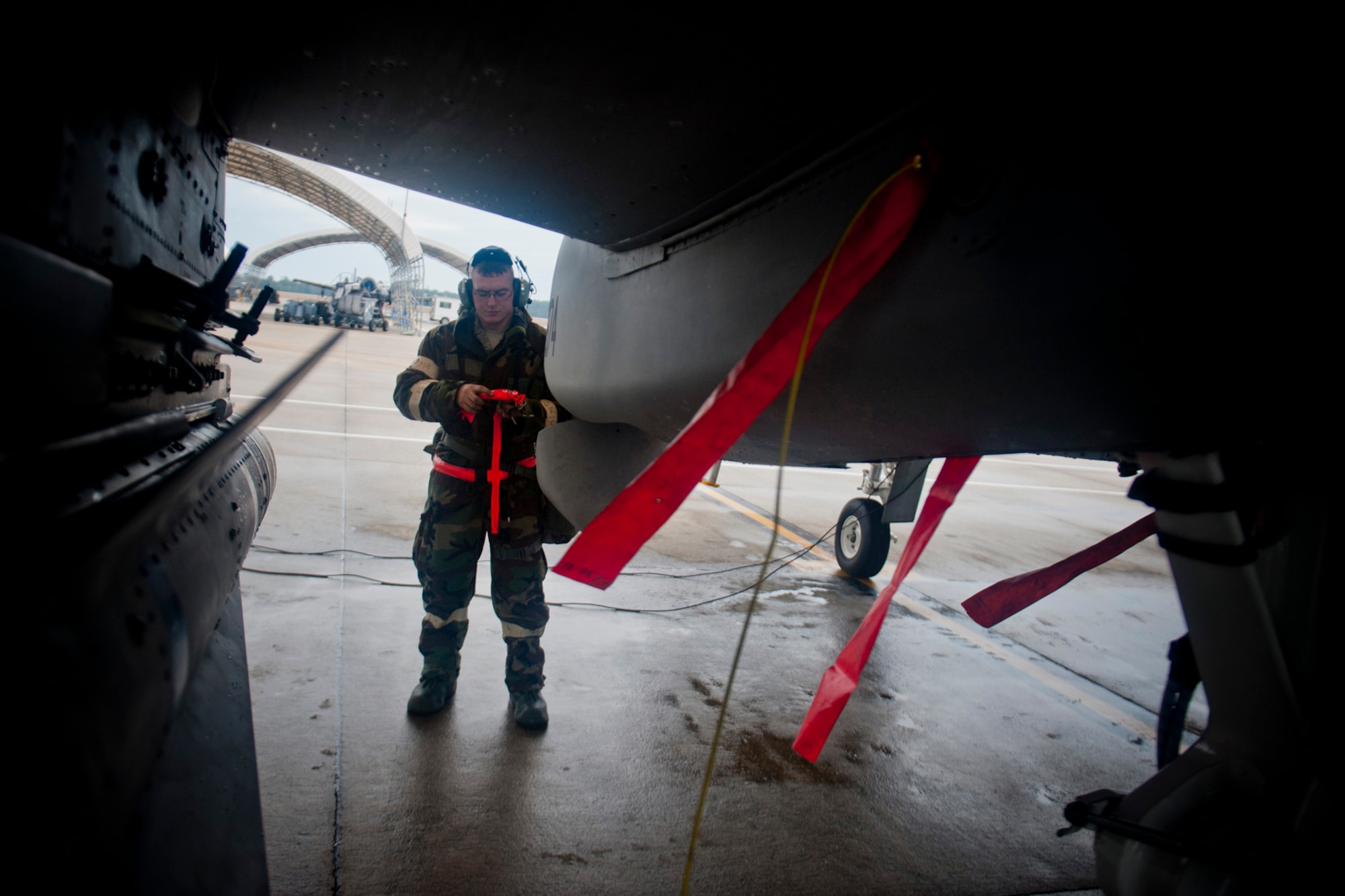 U.S. Air Force Senior Airman Joshua Vaughan, 23d Aircraft Maintenance Squadron crew chief, prepares an A-10C Thunderbolt II for flight during an operational readiness exercise Feb. 16, 2012, at Moody Air Force Base, Ga. Crew chiefs are critical to ensuring safety during and after flight missions. They are responsible for pre-flight inspections, launch recovery and service maintenance. (U.S. Air Force photo by Staff Sgt. Jamal D. Sutter/Released)