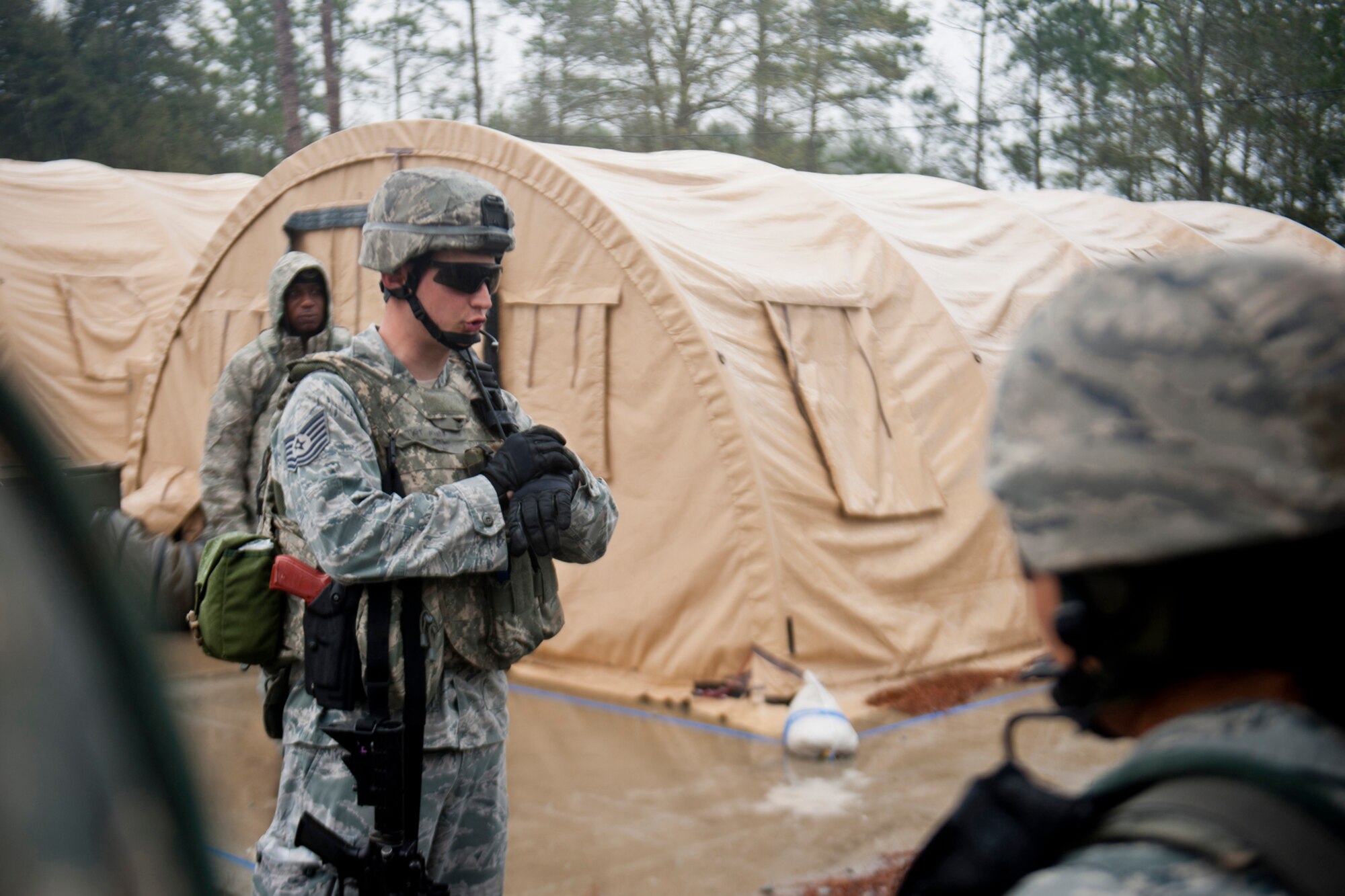 U.S. Air Force Tech. Sgt. Mark Drehl, 23d Security Forces Squadron squad leader, gives a pre-combat brief during an operational readiness exercise Feb. 16, 2012, at Moody Air Force Base, Ga. During the ORE, the unit maintained a 360-degree security and controlled the entry control point at the field training exercise site. (U.S. Air Force photo by Staff Sgt. Jamal D. Sutter/Released) 