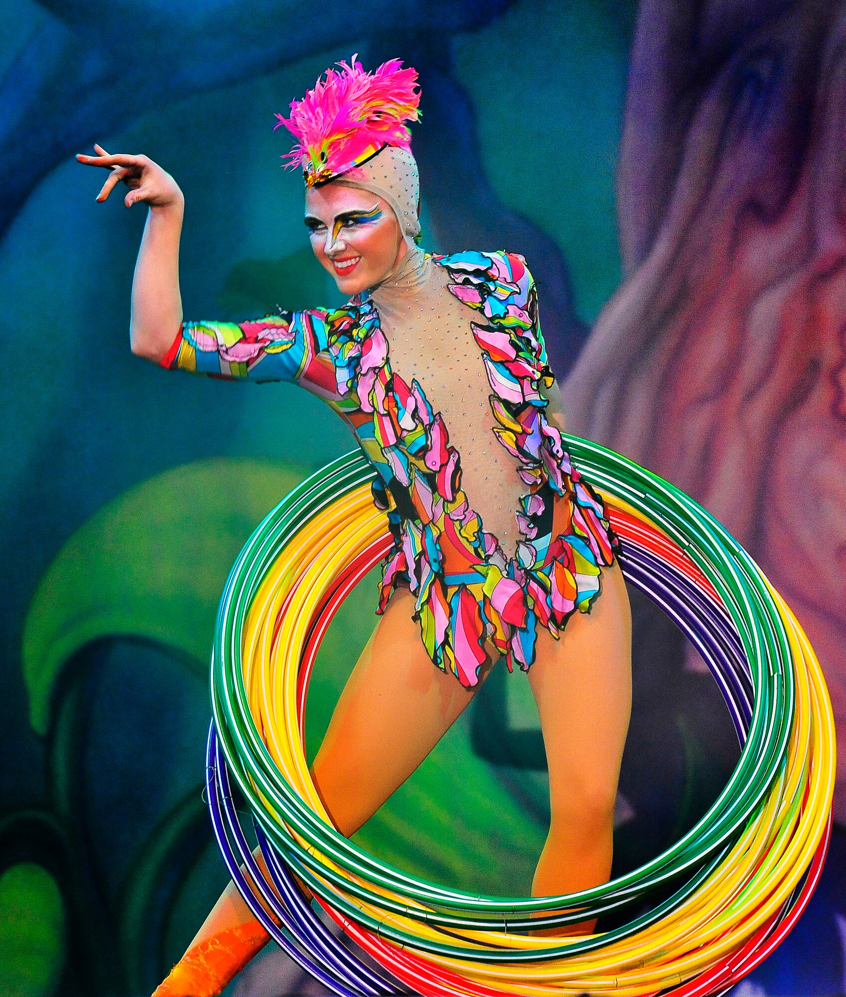 Members of Team Ramstein waited an hour in the cold for a warm seat to view Cirque Dreams "Jungle Fantasy” World Tour performance at Ramstein Air Base, Germany, Feb. 17, 2012.  The hour and a half show featured vibrant costumes, amazing acts of physical strength and skill, aerial acts, tumblers, jugglers, gymnasts, contortionists and jokesters. Cirque Dreams partnered with Armed Forces Entertainment to perform "Jungle Fantasy" at 17 military installations in 10 different countries through Asia and Europe.  (U.S. Air Force Photo by/ Staff Sgt. Daylena Gonzalez)