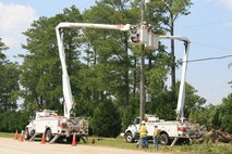 Electricians fix power outages aboard Marine Corps Air Station New River, N.C., Aug. 29 after Hurricane Irene hit the area Aug. 27, which left a path of destruction aboard the air station and coastal Carolina.

