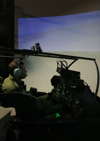Captain Turan Calikusu, a Turkish army AH-1W Super Cobra pilot, practices flying on a simulator. Four Turkish army Super Cobra pilots visited Marine Corps Air Station New River to practice emergency and weapons procedures on a simluator from Sept. 12 to Sept. 30.