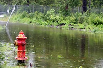 Flooding from Hurricane Irene covers a running path aboard Marine Corps Air Station New River, N.C., Aug. 27, 2011. The aftermath of Hurricane Irene left a path of destruction aboard MCAS New River, N.C, and coastal Carolina. 