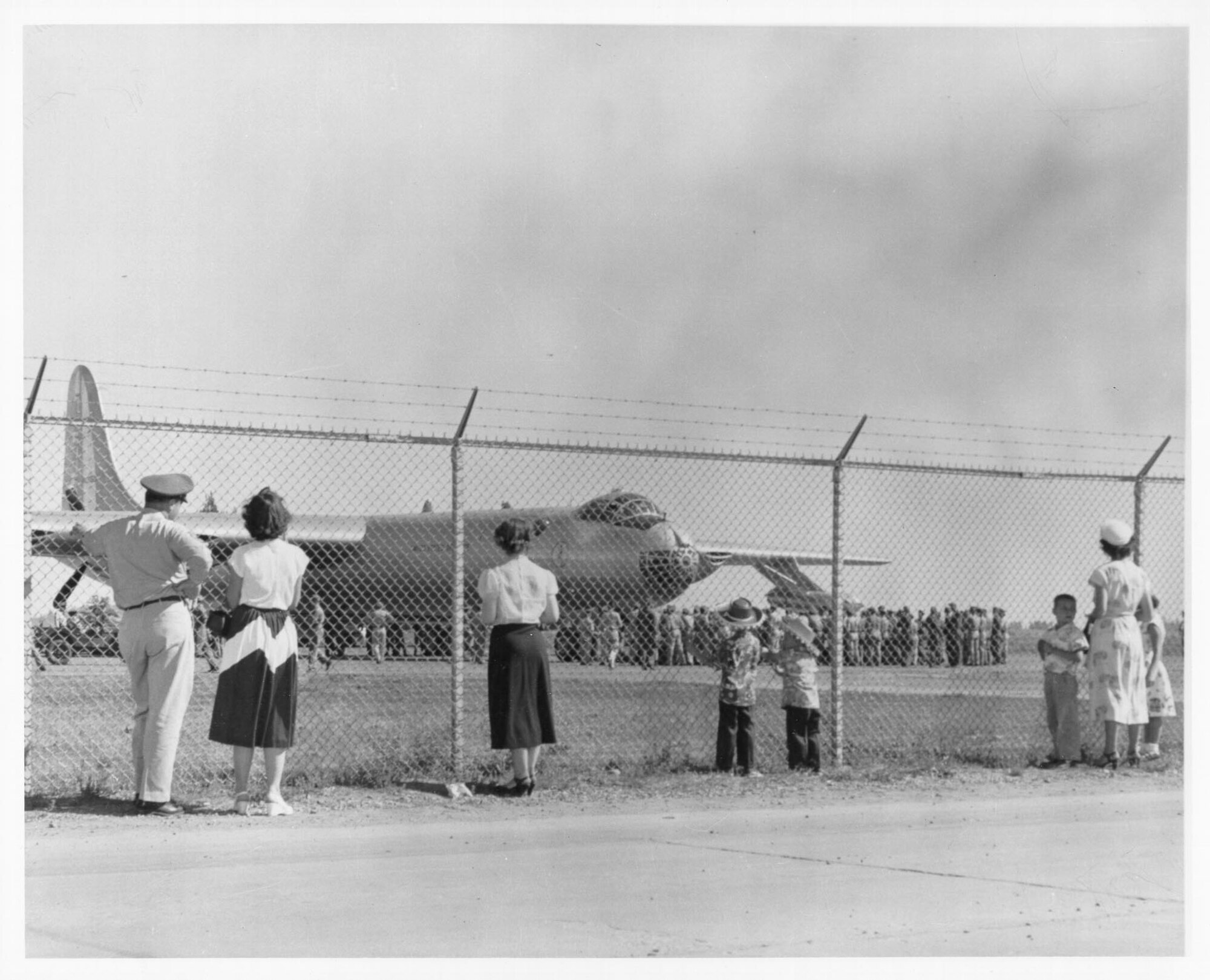 People celebrate the arrival of the first B-36 Peacemaker at Fairchild in 1951. The B-36 replaced the B-29 and remained at Fairchild until 1956 when it was replaced by the all-jet B-52 Stratofortress. (Courtesy photo)