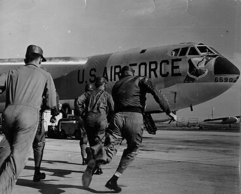 B-52 Stratofortress crews scramble during an alert in 1961 at Fairchild Air Force Base, Wash. (Courtesy photo)